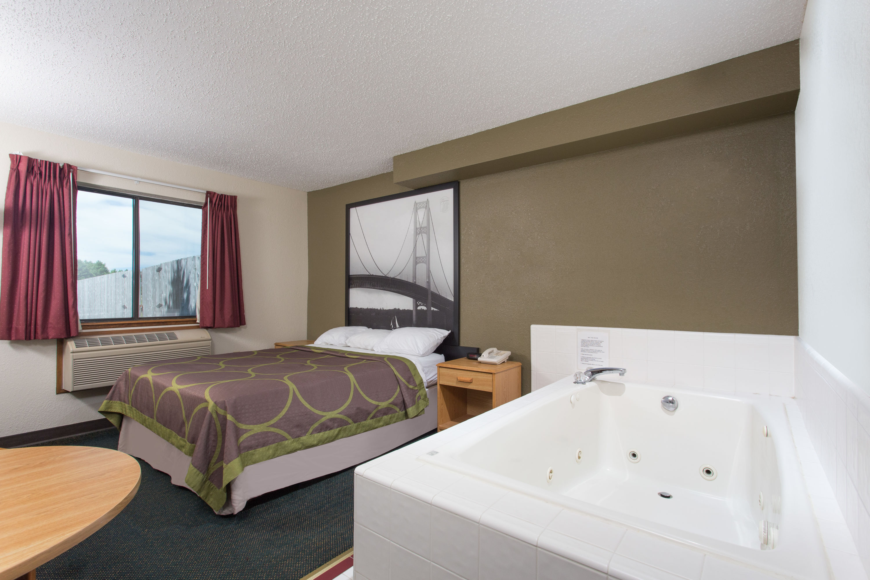 Guest room at the Super 8 by Wyndham Houghton Lake in Houghton Lake, Michigan