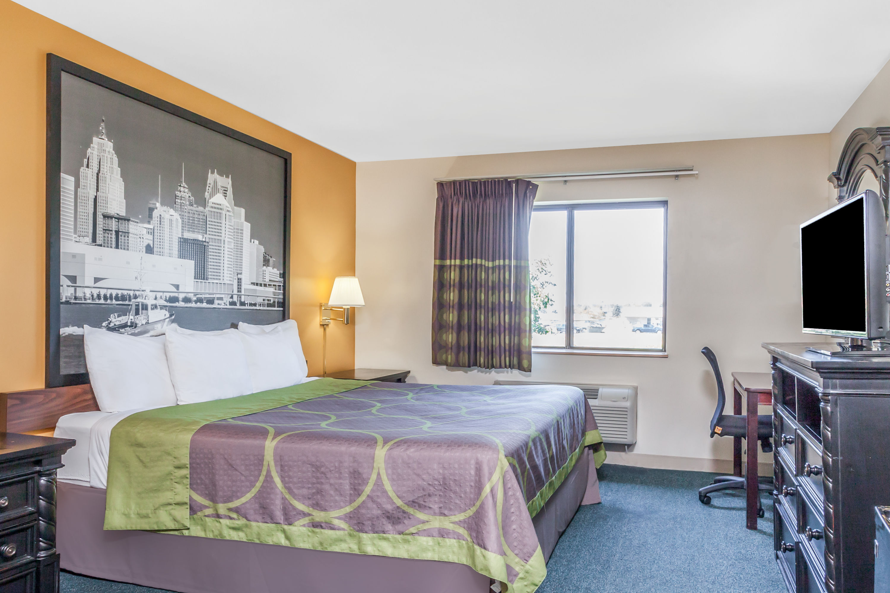 Guest room at the Super 8 by Wyndham Imlay City in Imlay City, Michigan