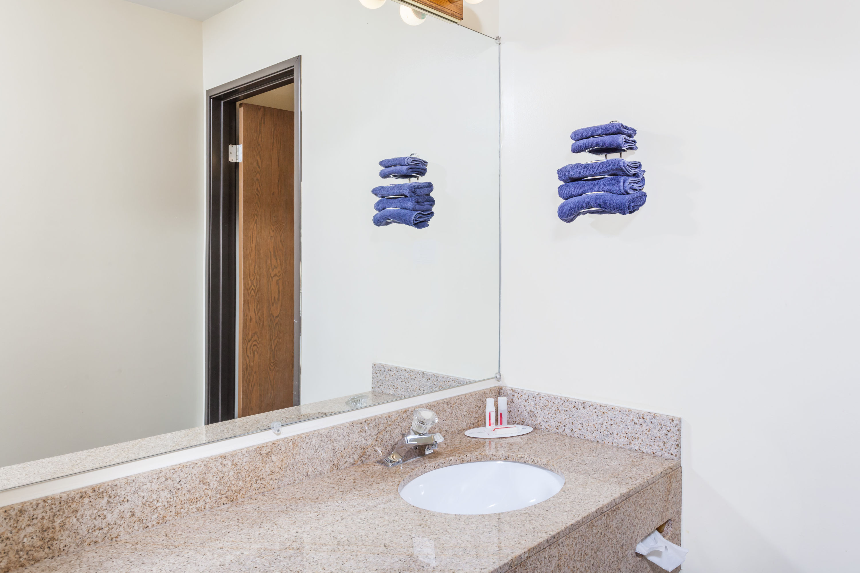 Guest room at the Super 8 by Wyndham Imlay City in Imlay City, Michigan