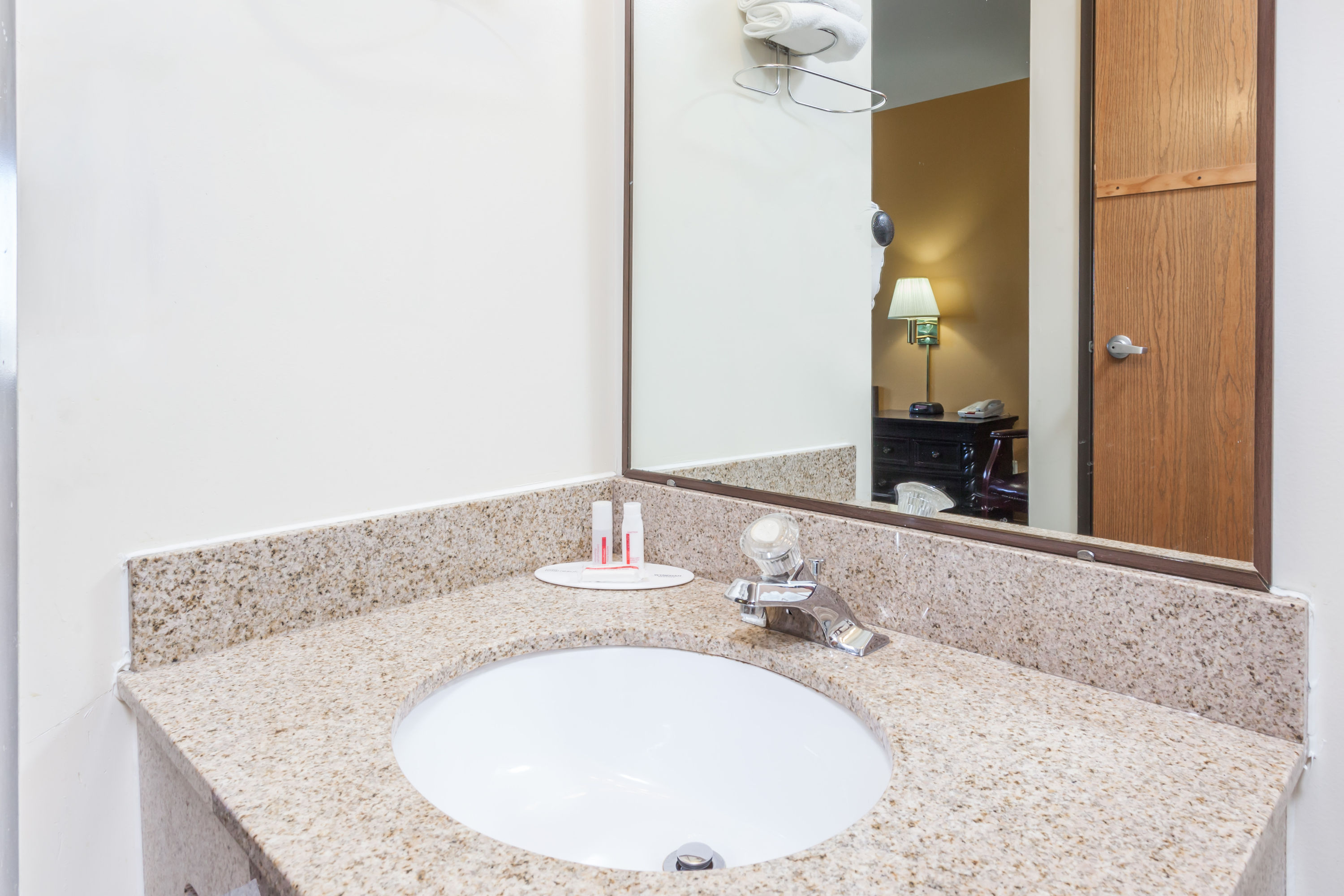 Guest room at the Super 8 by Wyndham Imlay City in Imlay City, Michigan