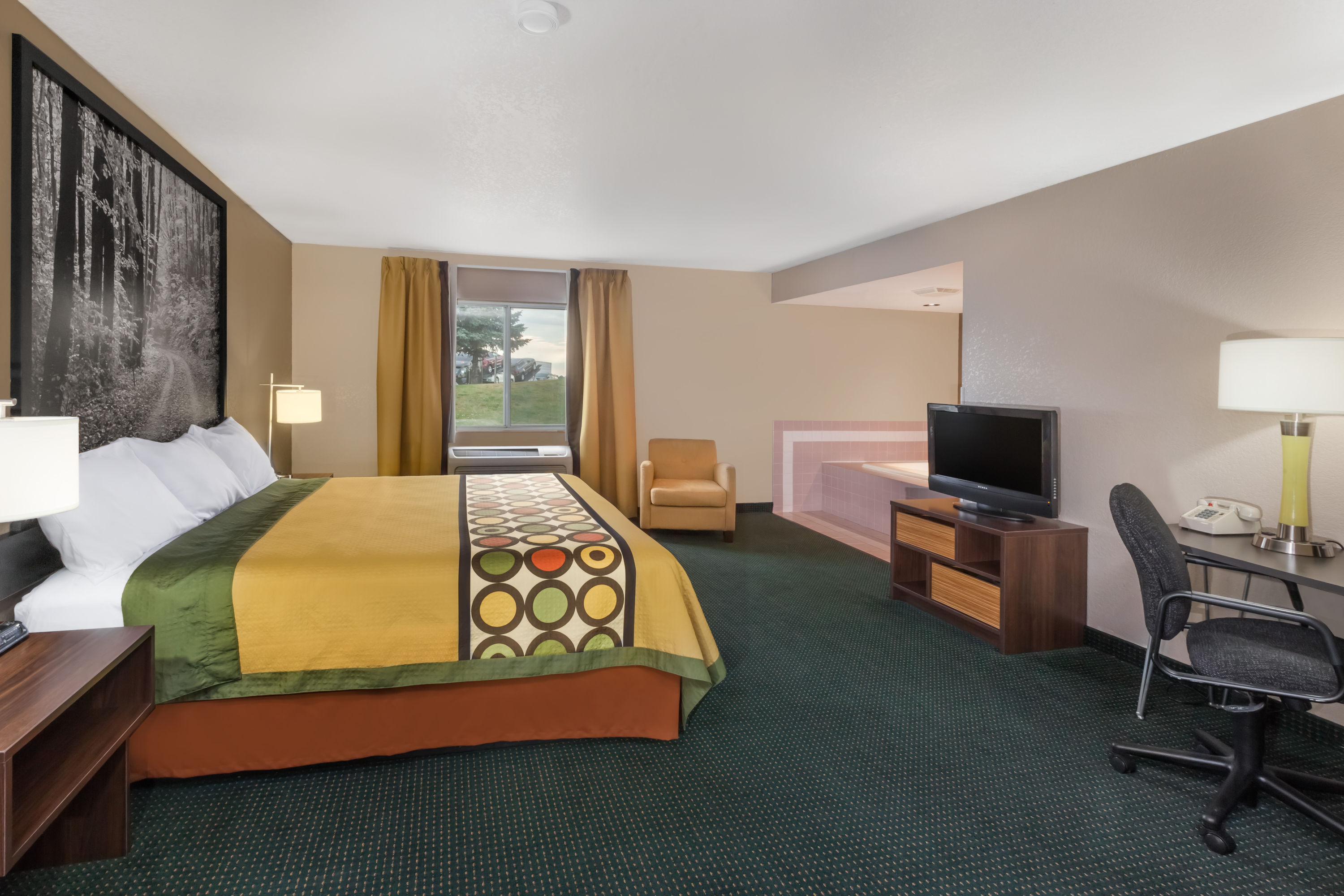 Guest room at the Super 8 by Wyndham Ionia MI in Ionia, Michigan