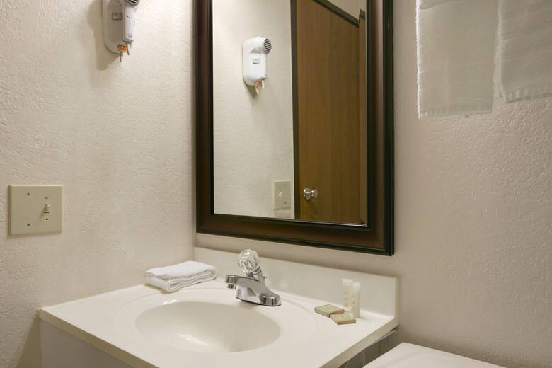 Guest room at the Super 8 Saginaw in Saginaw, Michigan