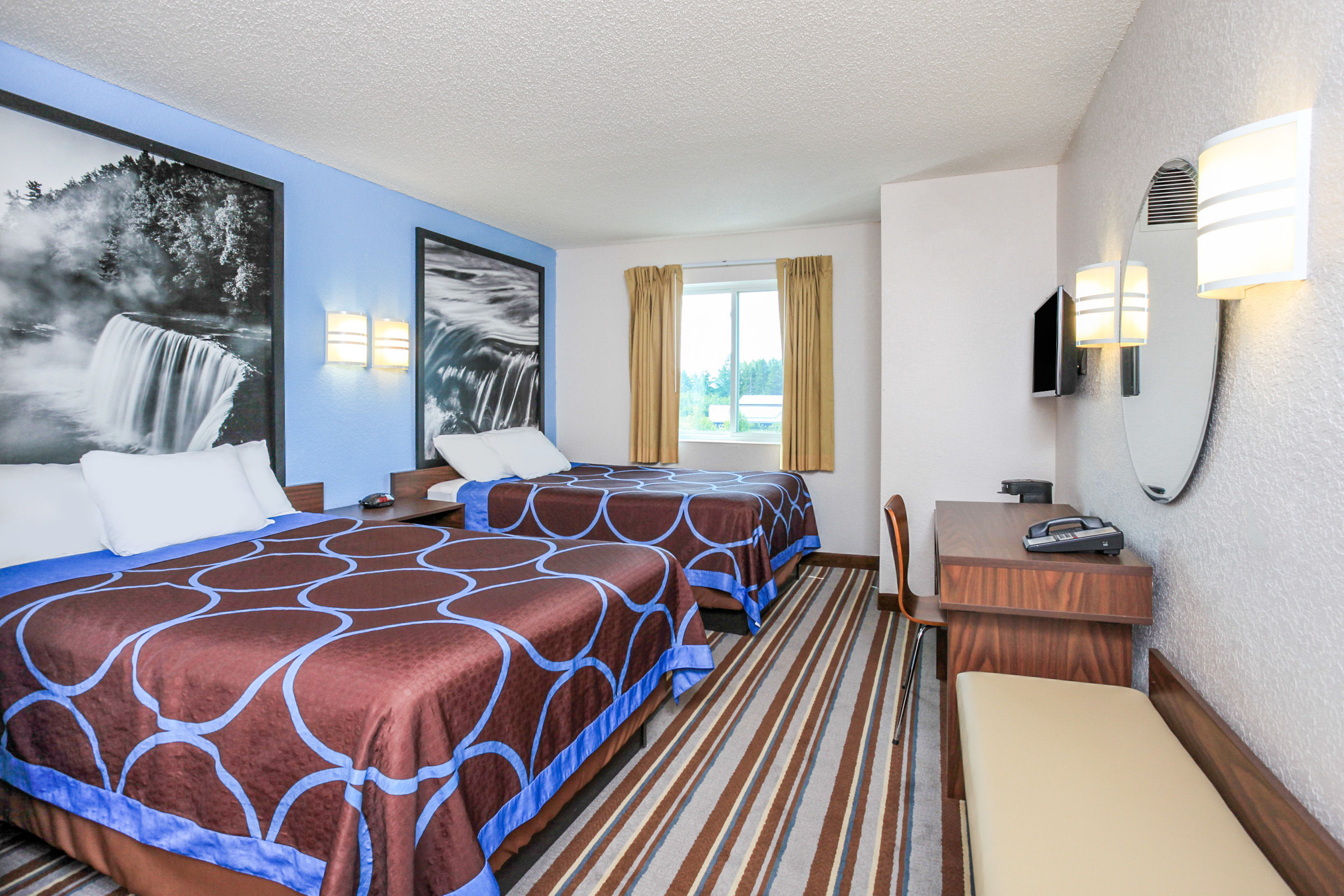 Guest room at the Super 8 by Wyndham Sault Ste. Marie in Sault Sainte Marie, Michigan
