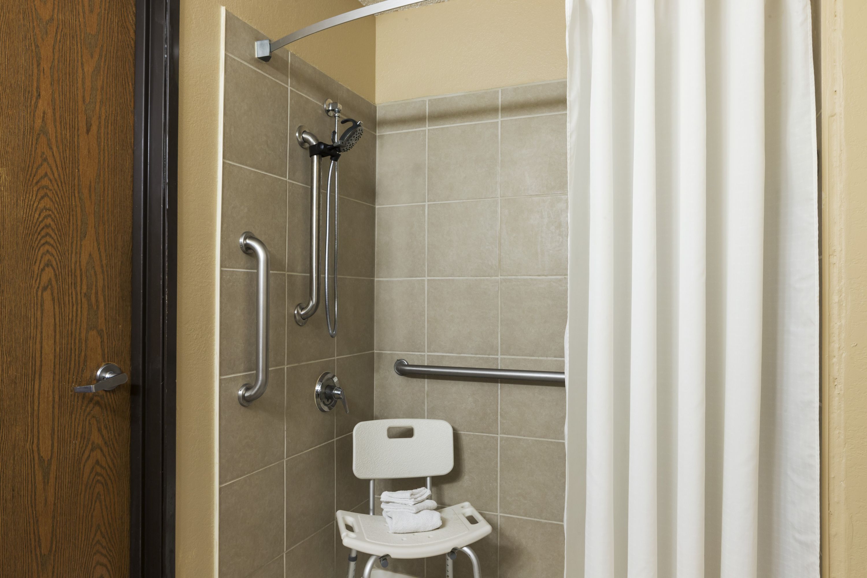 Guest room at the Super 8 by Wyndham Taylor/Detroit Area in Taylor, Michigan