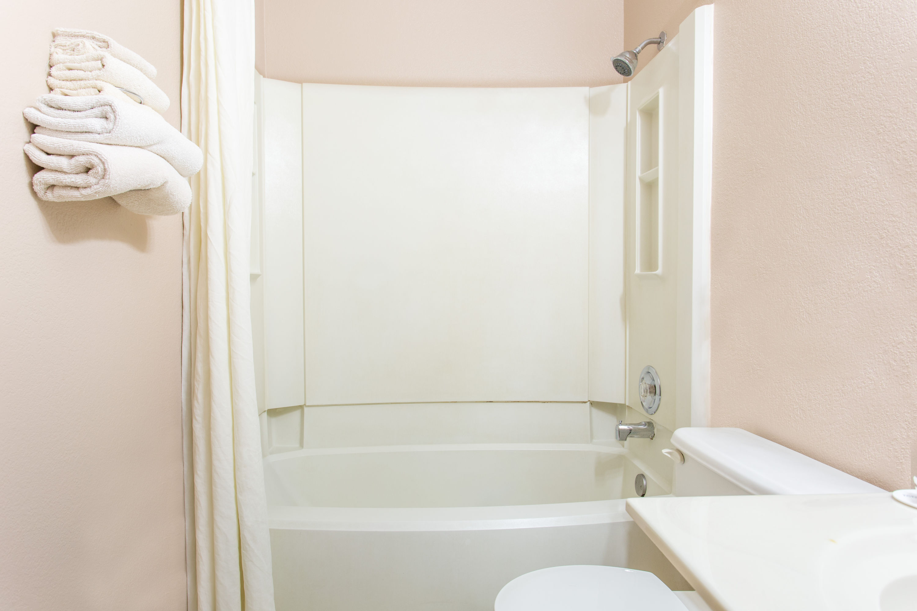 Guest room bath at the Super 8 by Wyndham Austin MN in Austin, Minnesota