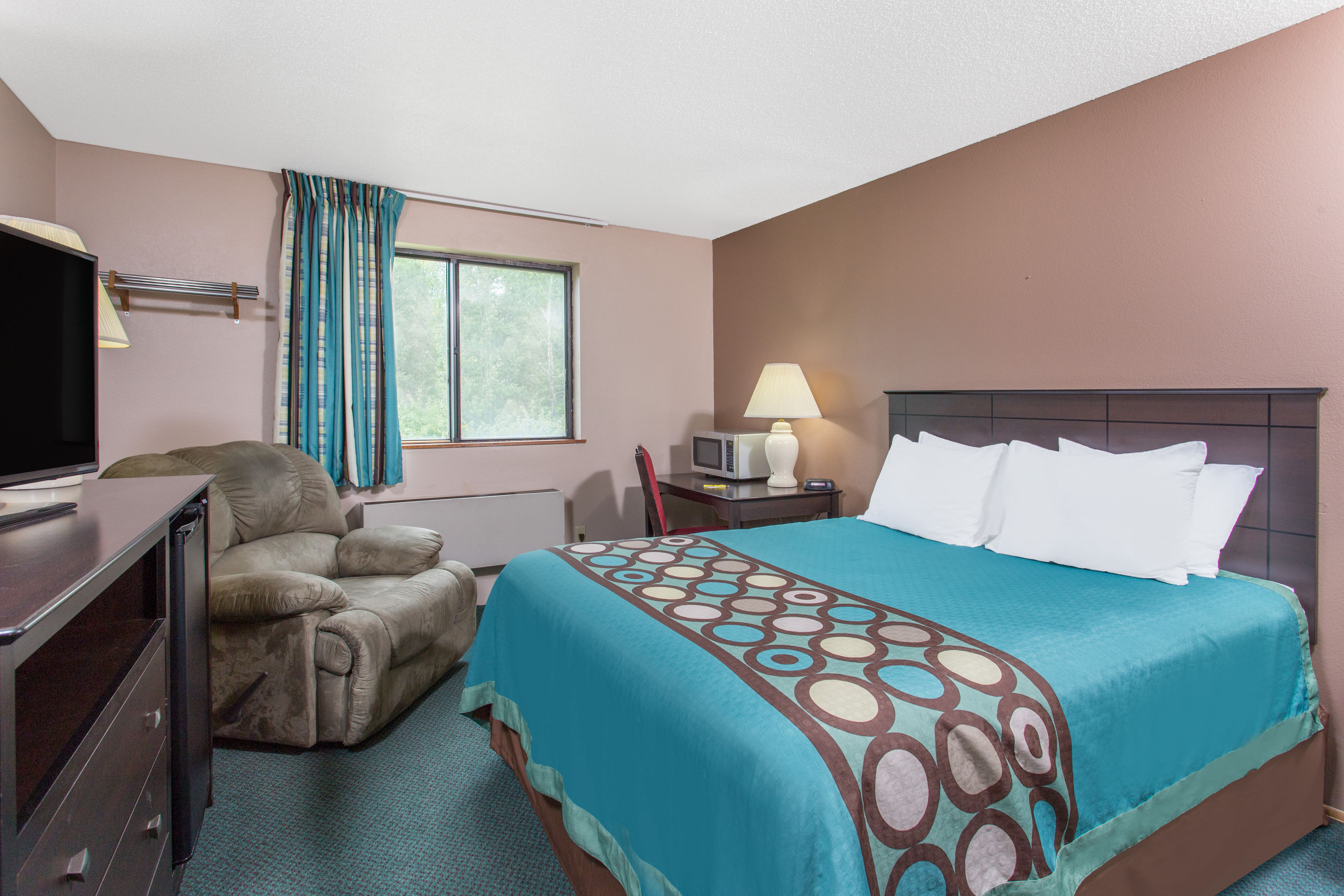 Guest room at the Super 8 by Wyndham Austin MN in Austin, Minnesota