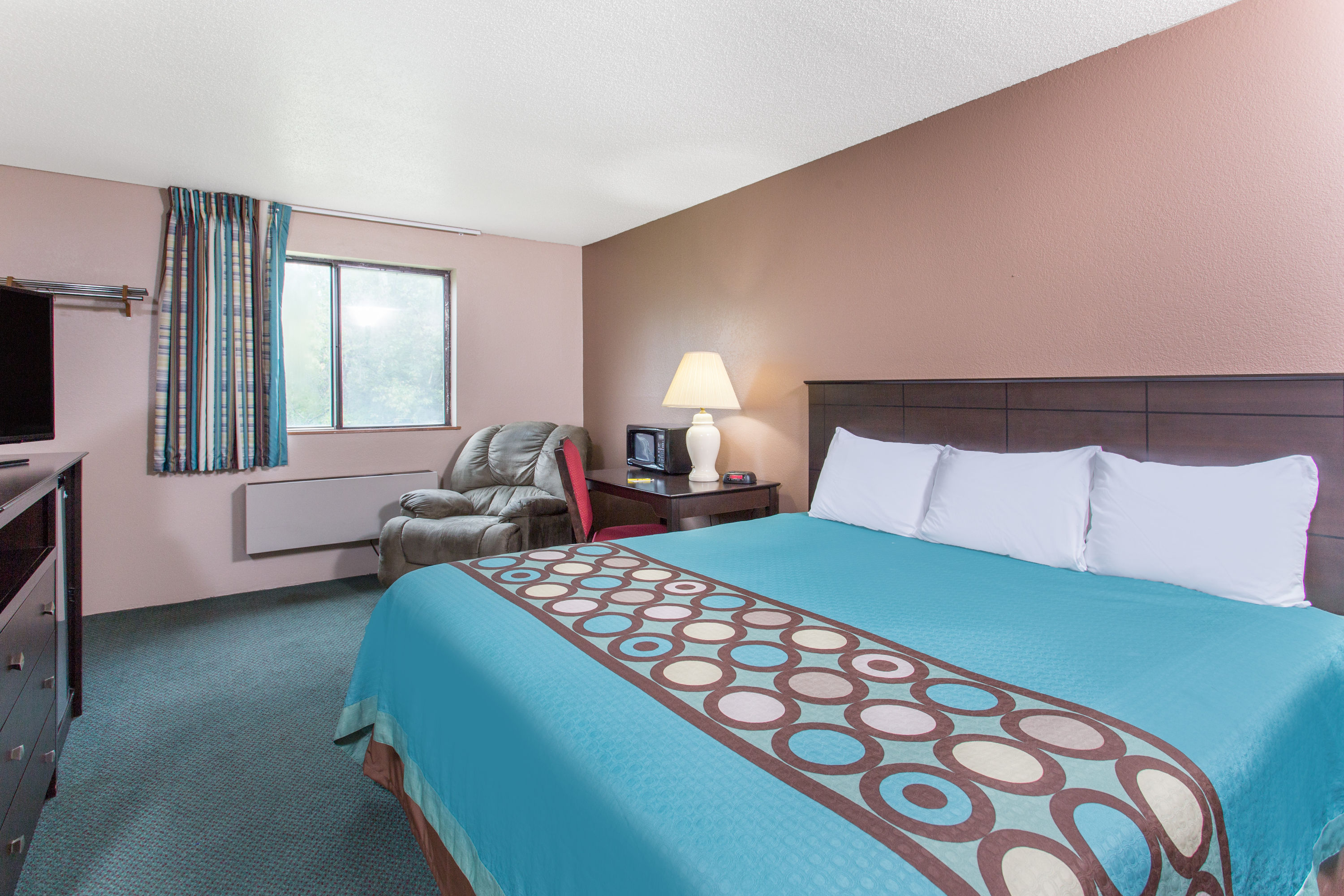 Guest room at the Super 8 by Wyndham Austin MN in Austin, Minnesota