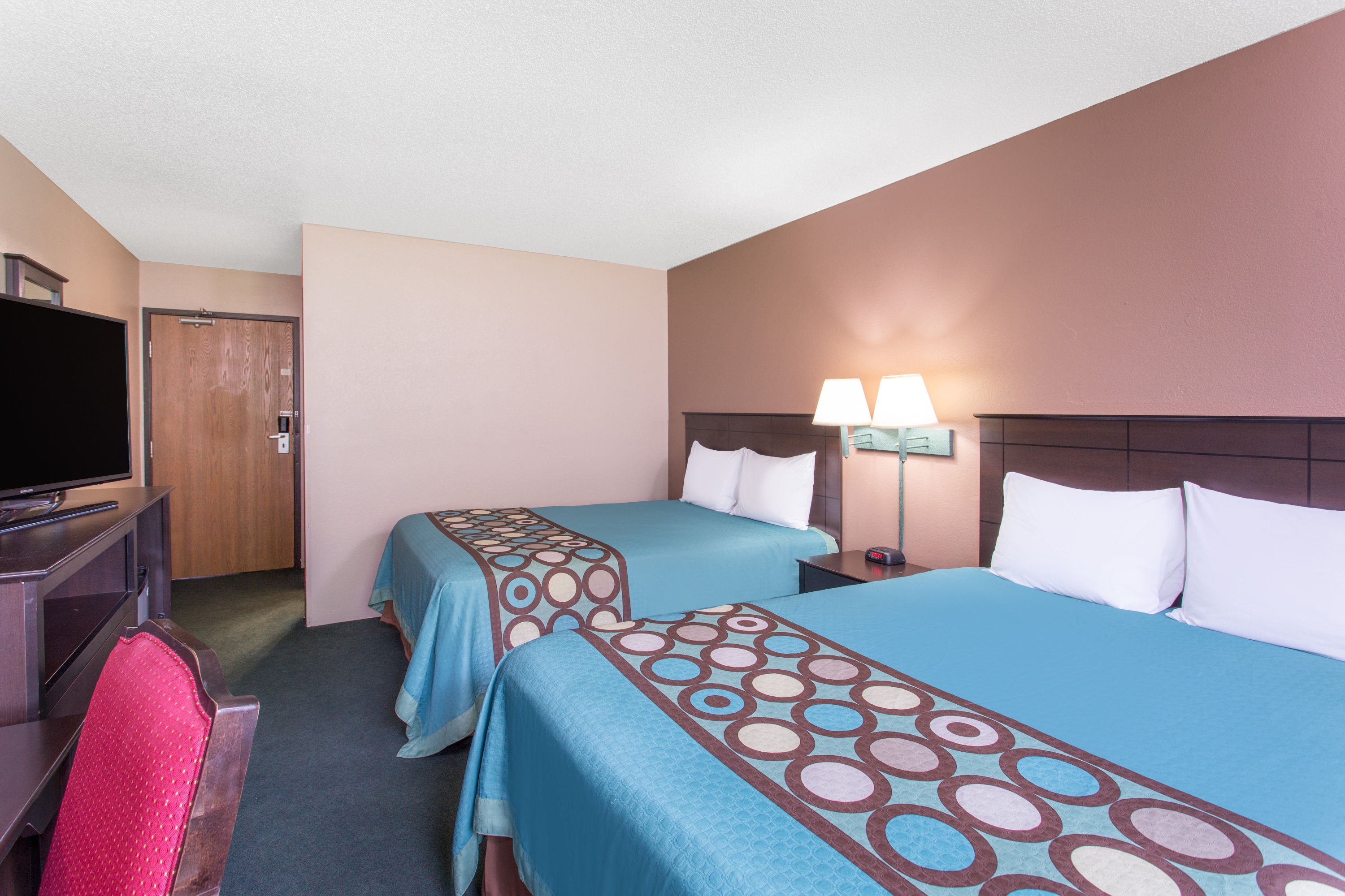 Guest room at the Super 8 by Wyndham Austin MN in Austin, Minnesota