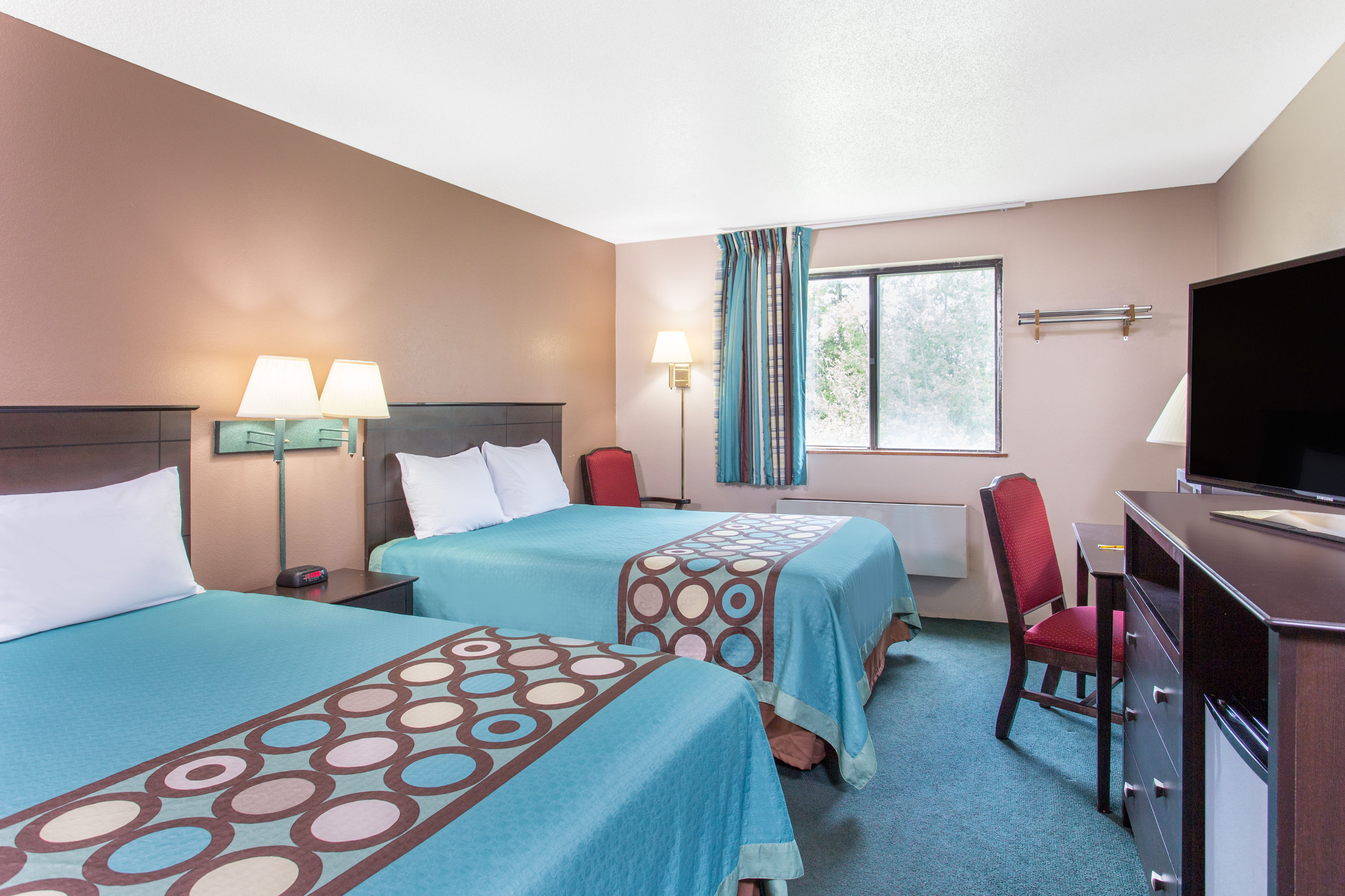 Guest room at the Super 8 by Wyndham Austin MN in Austin, Minnesota