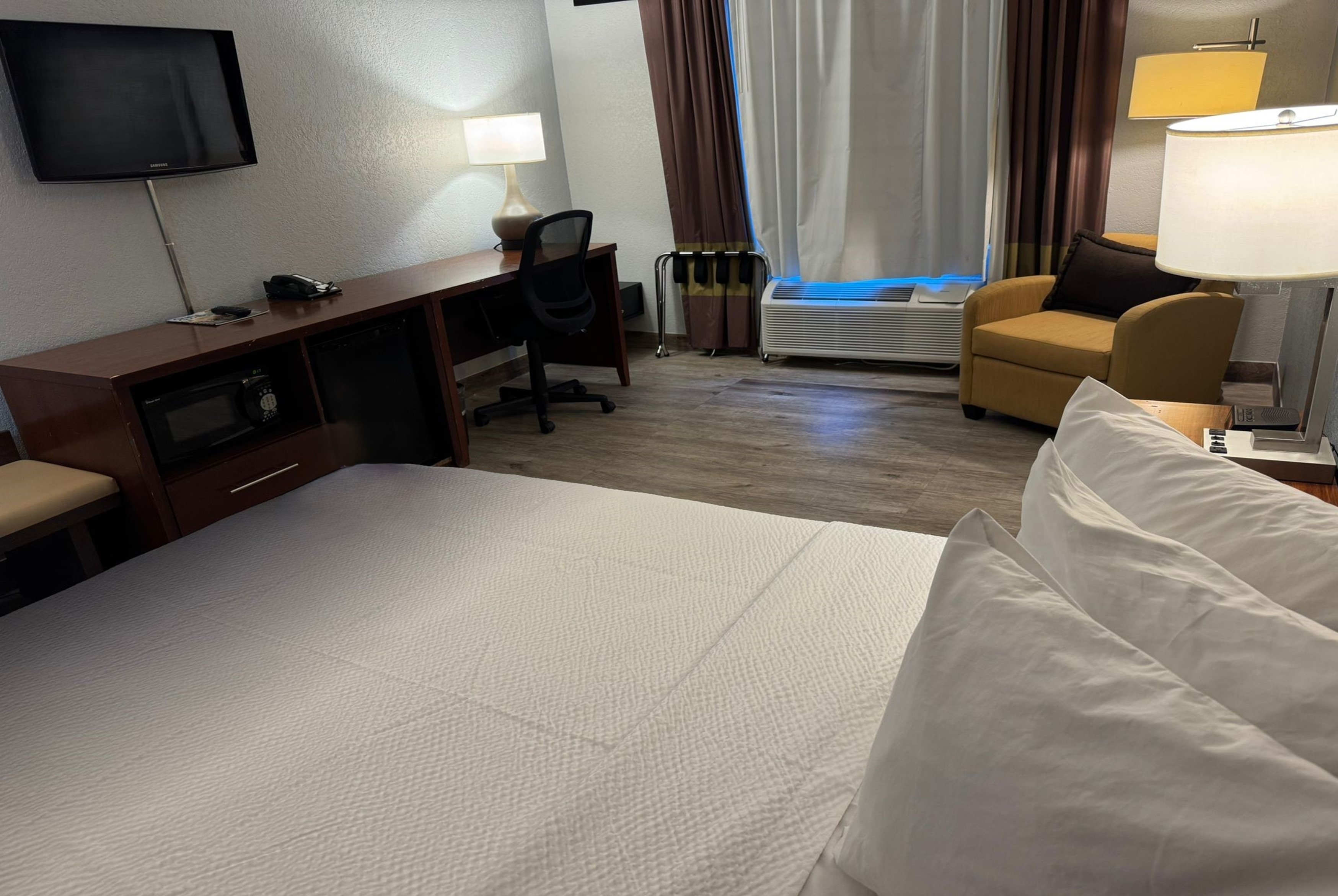 Guest room at the Super 8 by Wyndham Bloomington/Airport in Bloomington, Minnesota