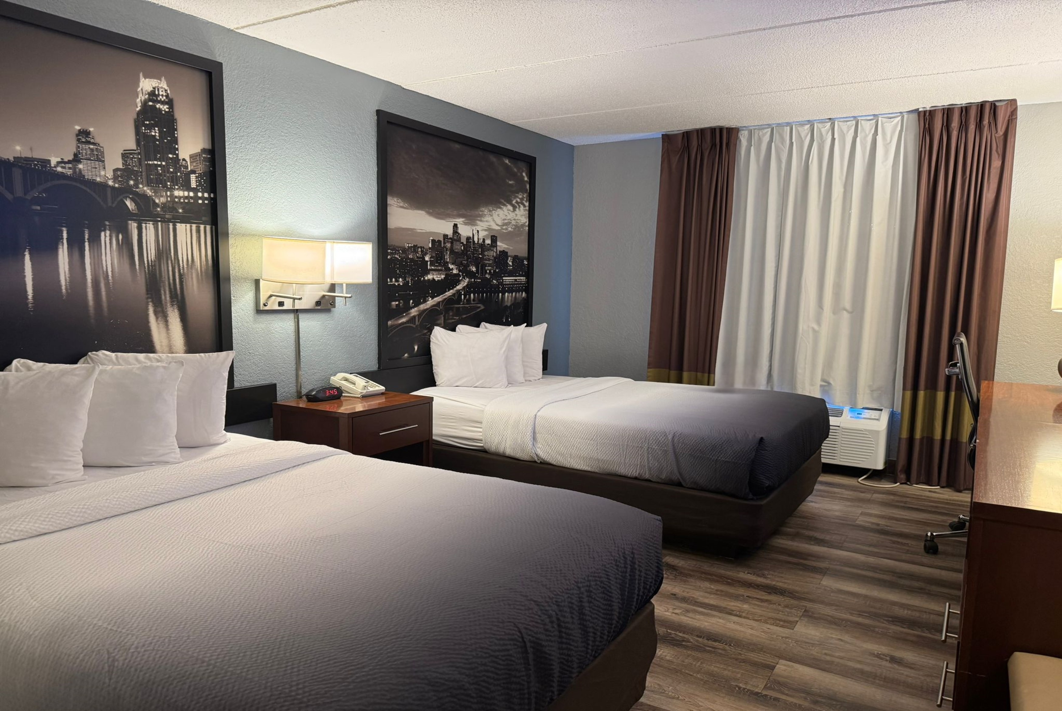 Guest room at the Super 8 by Wyndham Bloomington/Airport in Bloomington, Minnesota