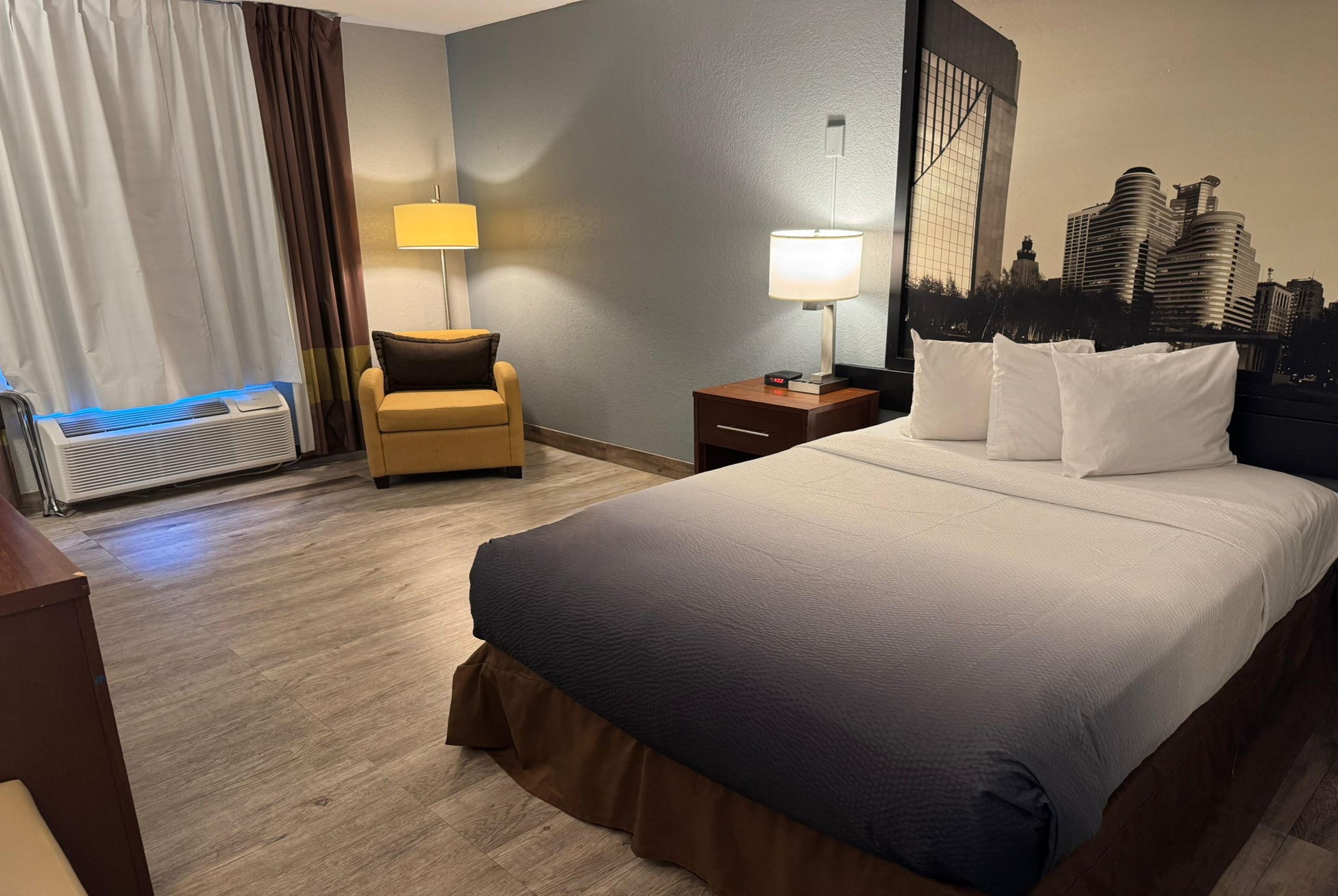 Guest room at the Super 8 by Wyndham Bloomington/Airport in Bloomington, Minnesota