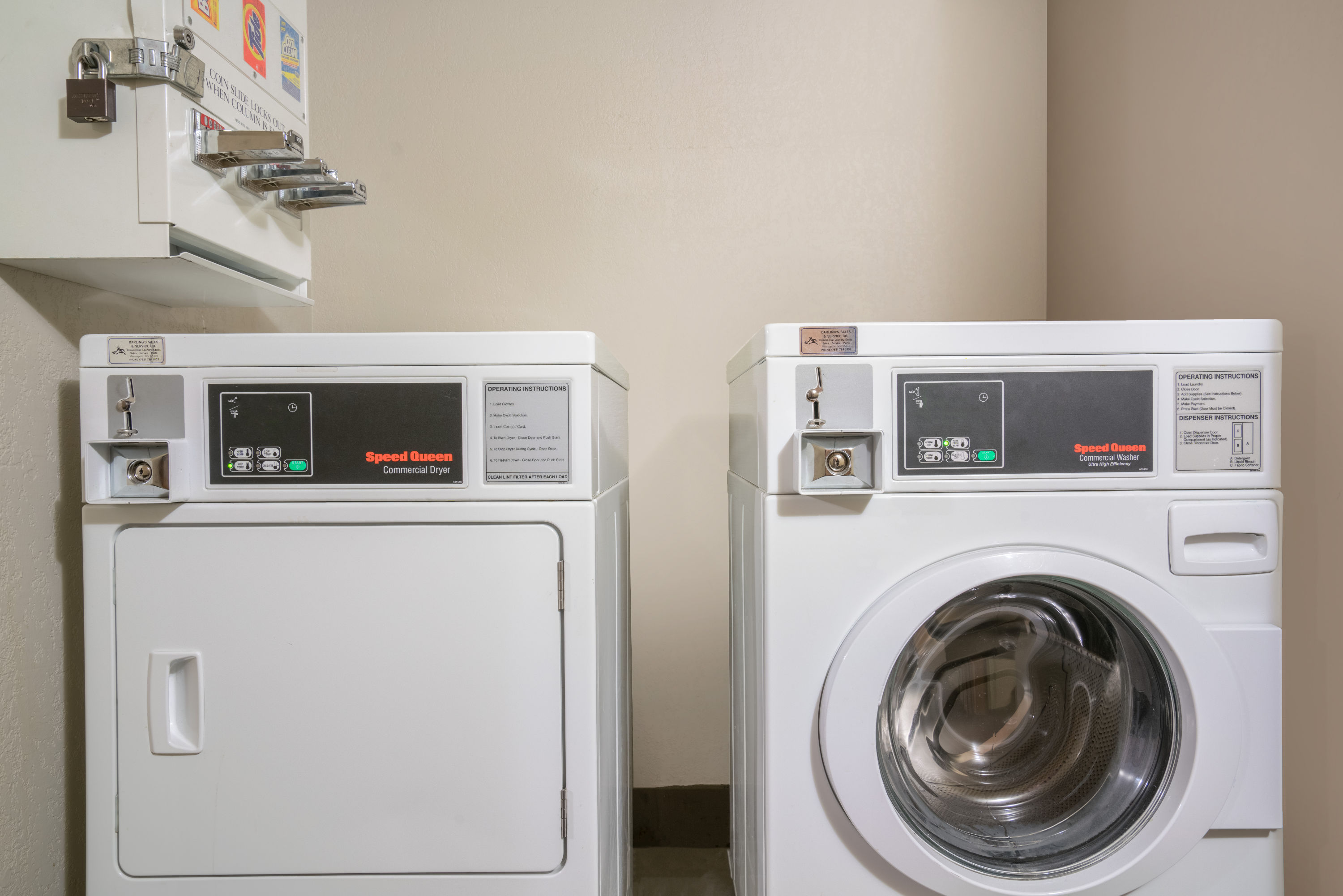 Laundry facilities at Super 8 by Wyndham Bloomington/Airport in Bloomington, Minnesota
