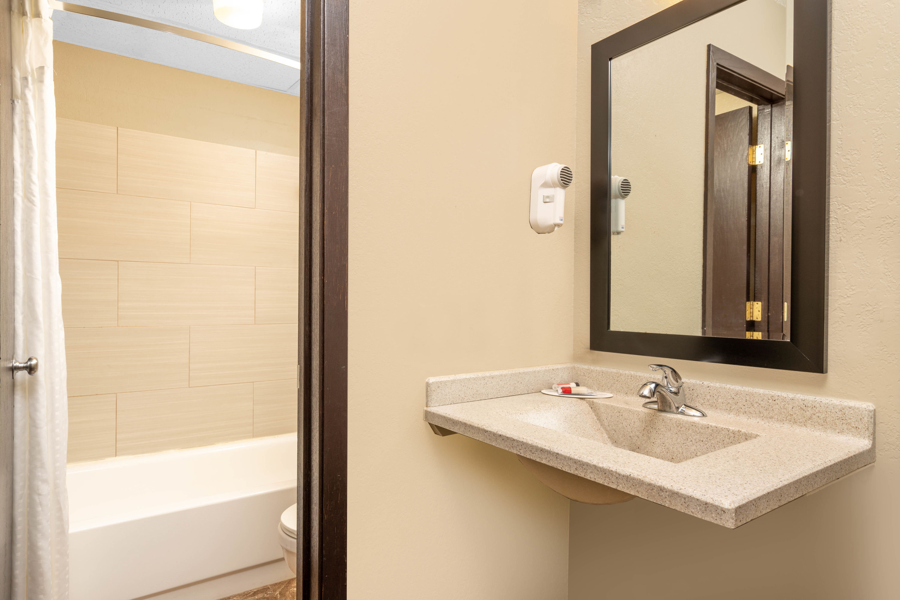 Guest room bath at the Super 8 by Wyndham Glenwood in Glenwood, Minnesota