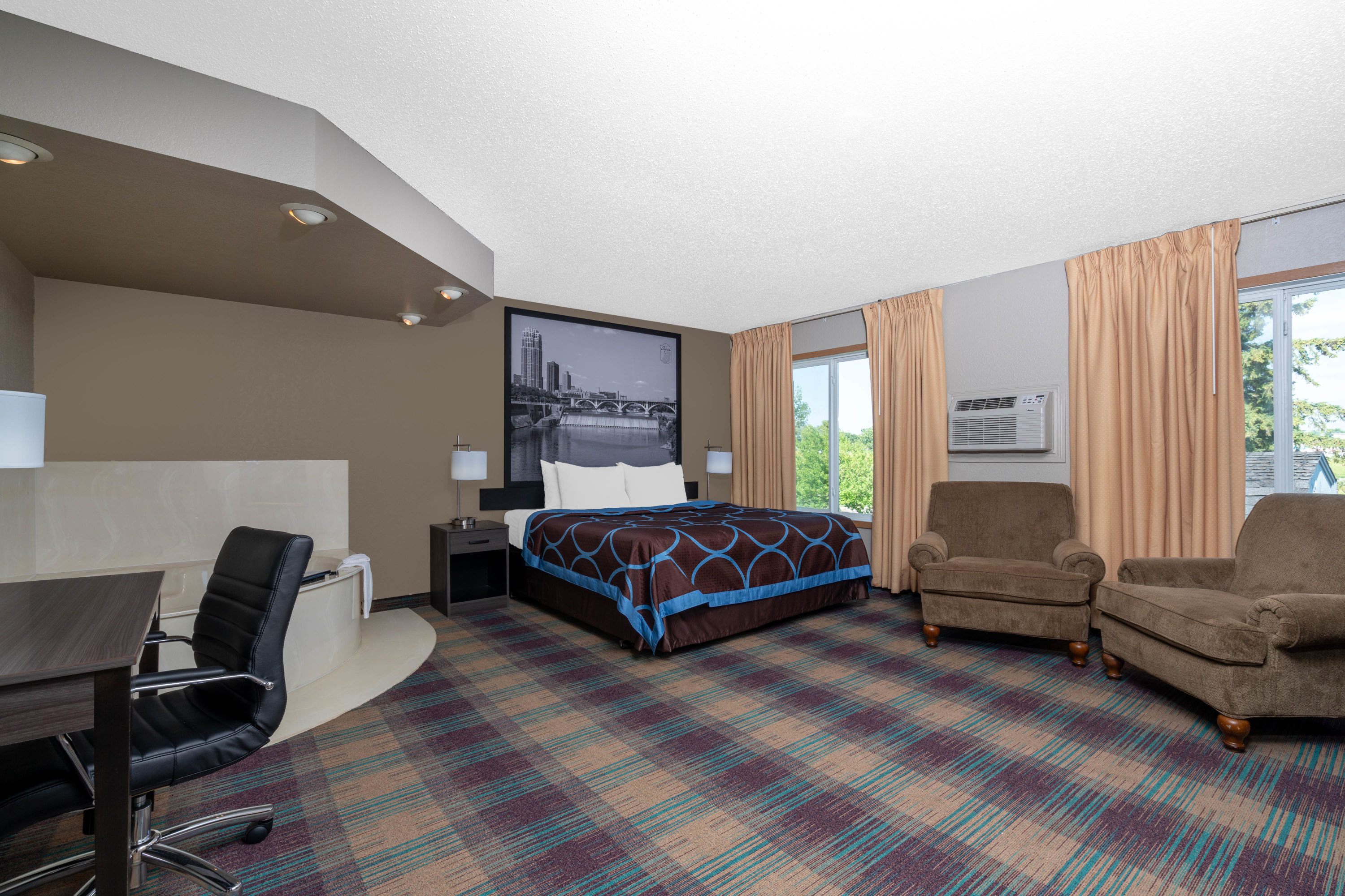 Super 8 by Wyndham Glenwood suite in Glenwood, Minnesota