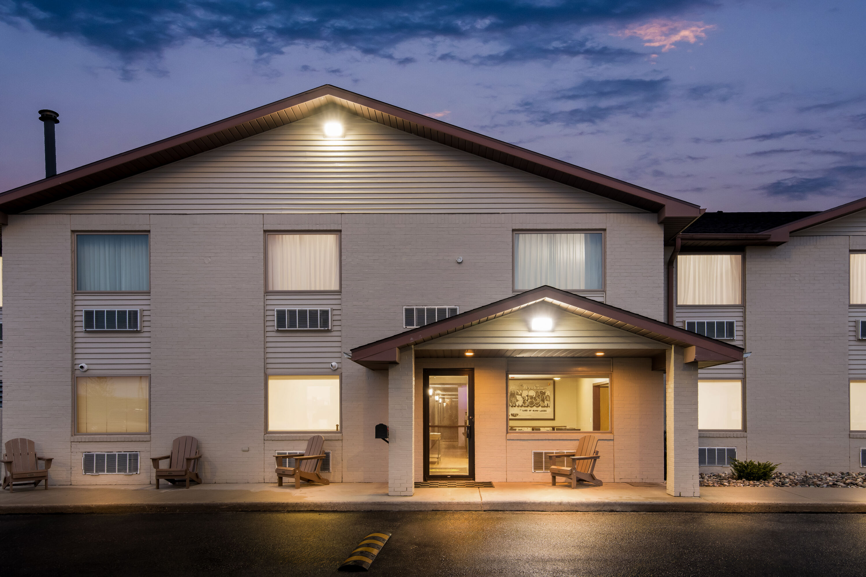 Exterior Night Image of Super 8 by Wyndham Perham hotel in Perham, Minnesota
