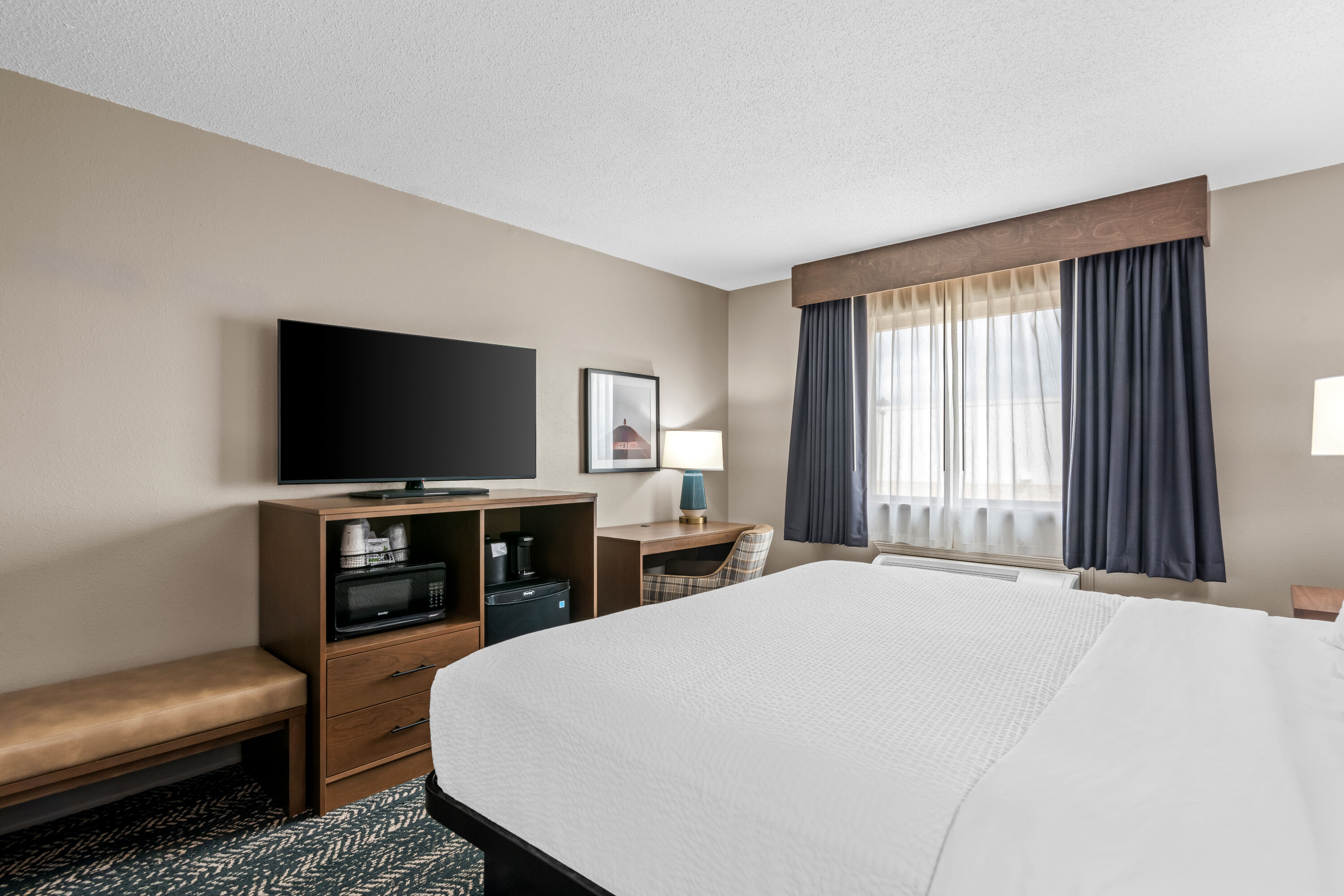 King bed guest room at the Super 8 by Wyndham Perham in Perham, Minnesota