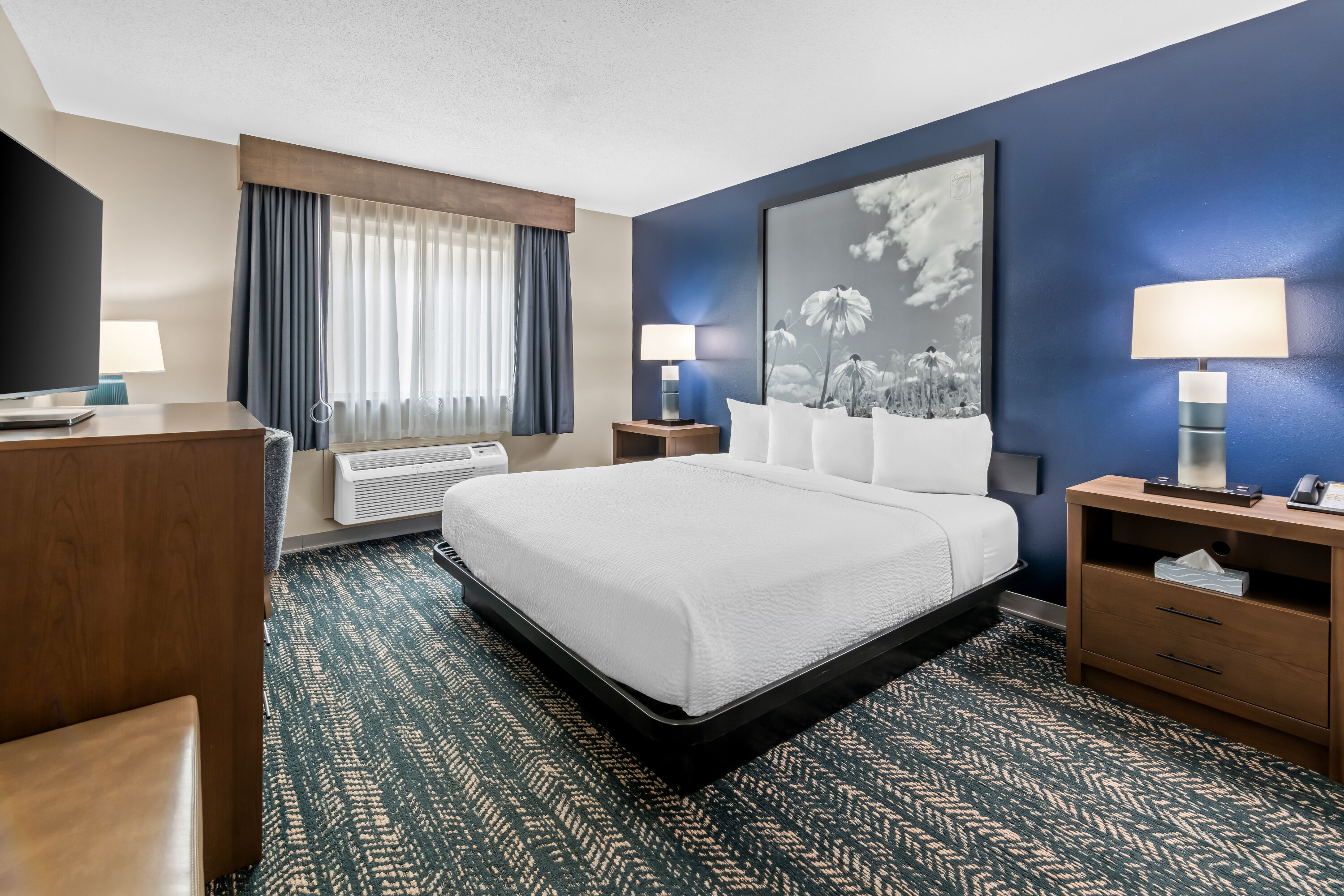 King bed guest room at the Super 8 by Wyndham Perham in Perham, Minnesota