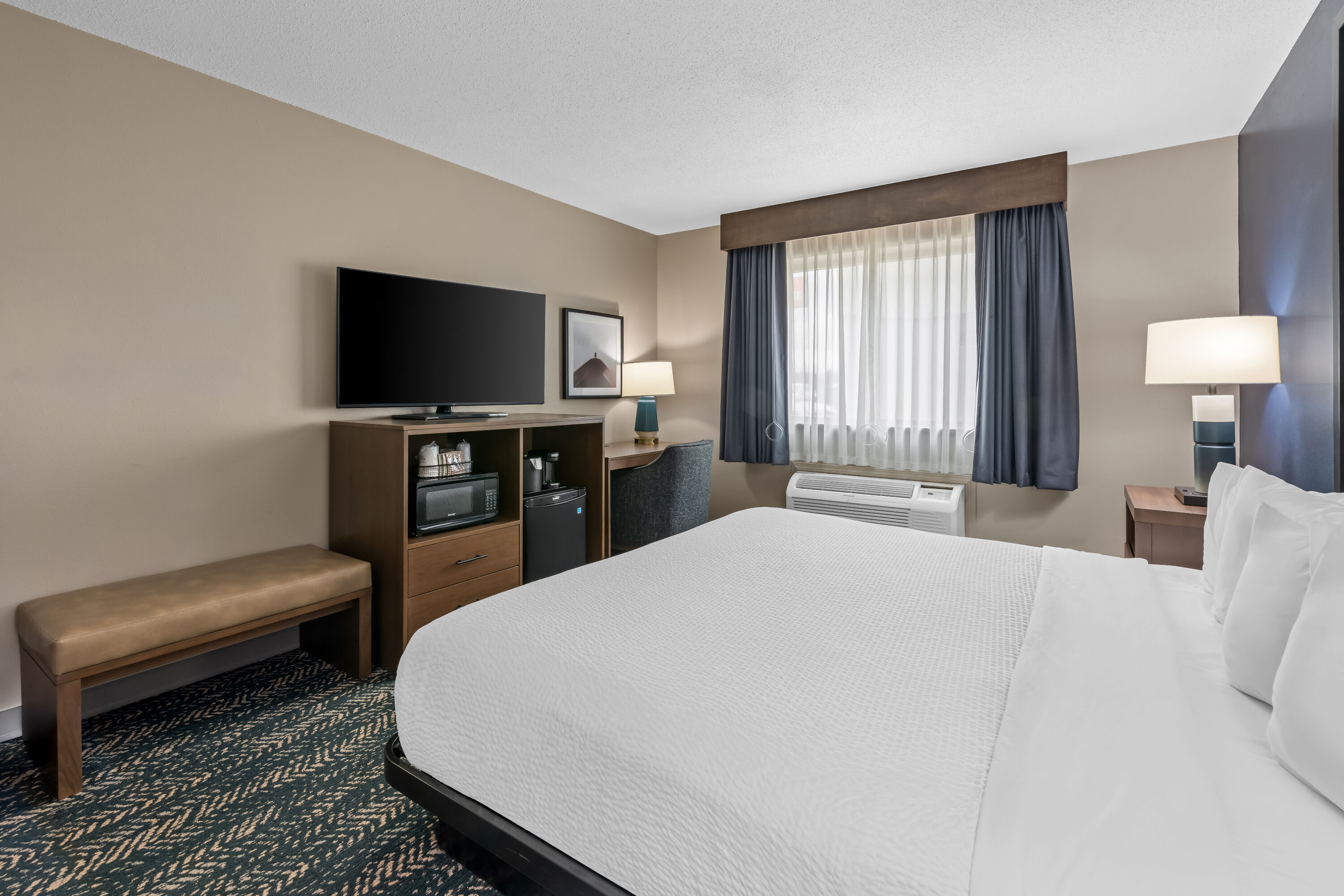King bed guest room at the Super 8 by Wyndham Perham in Perham, Minnesota