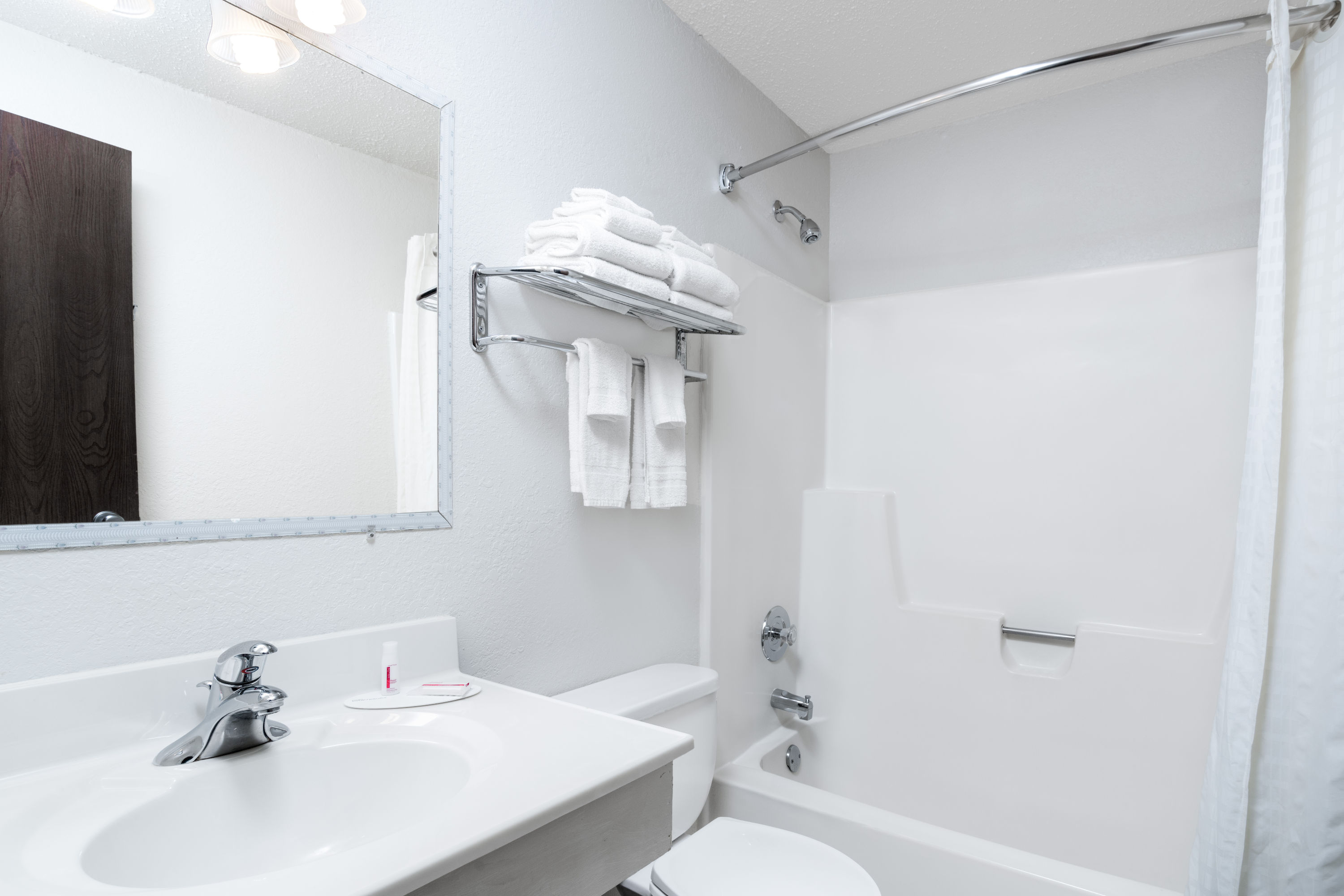 Guest room bath at the Super 8 by Wyndham Winona MN in Winona, Minnesota