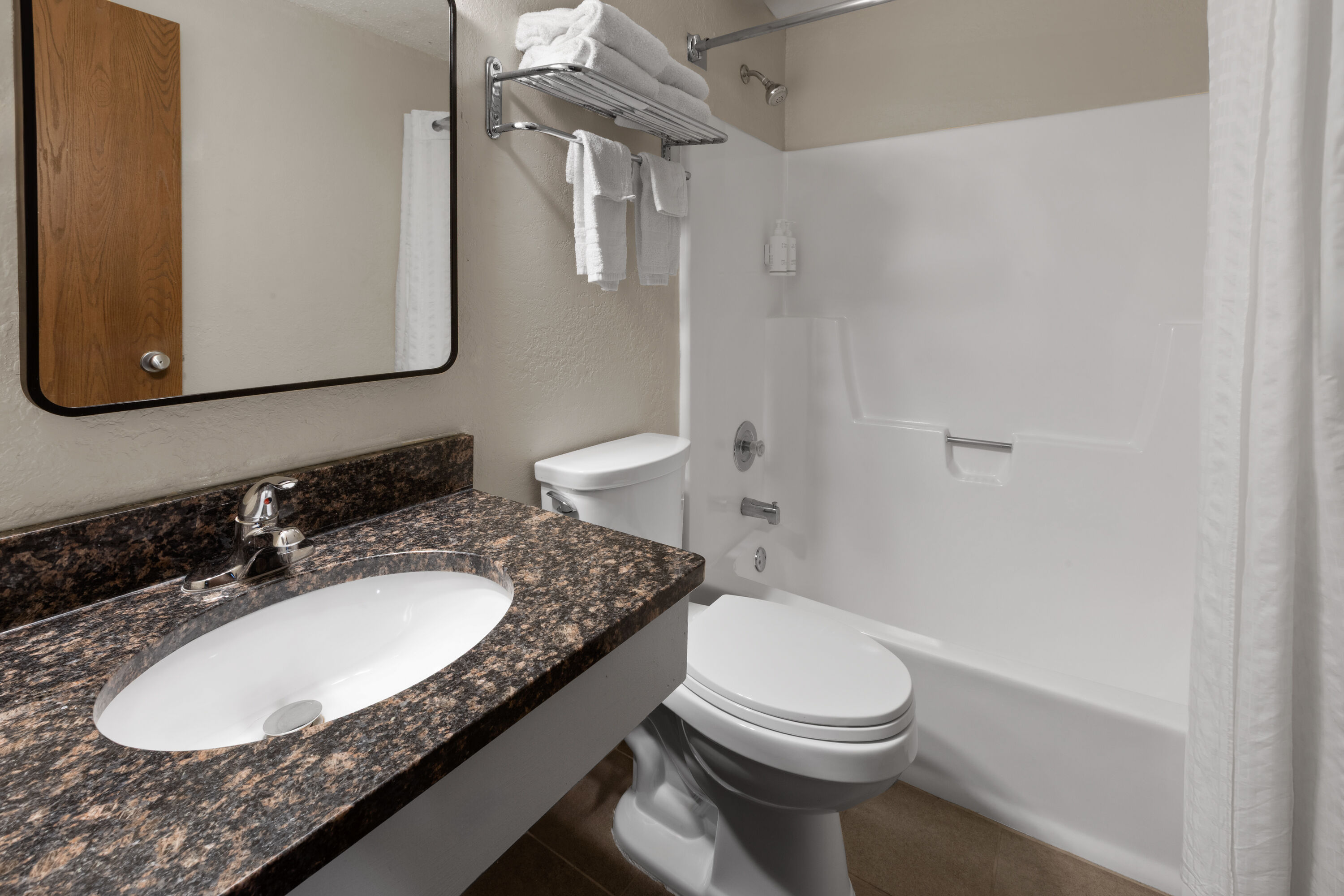 Guest room bath at the Super 8 by Wyndham Winona MN in Winona, Minnesota