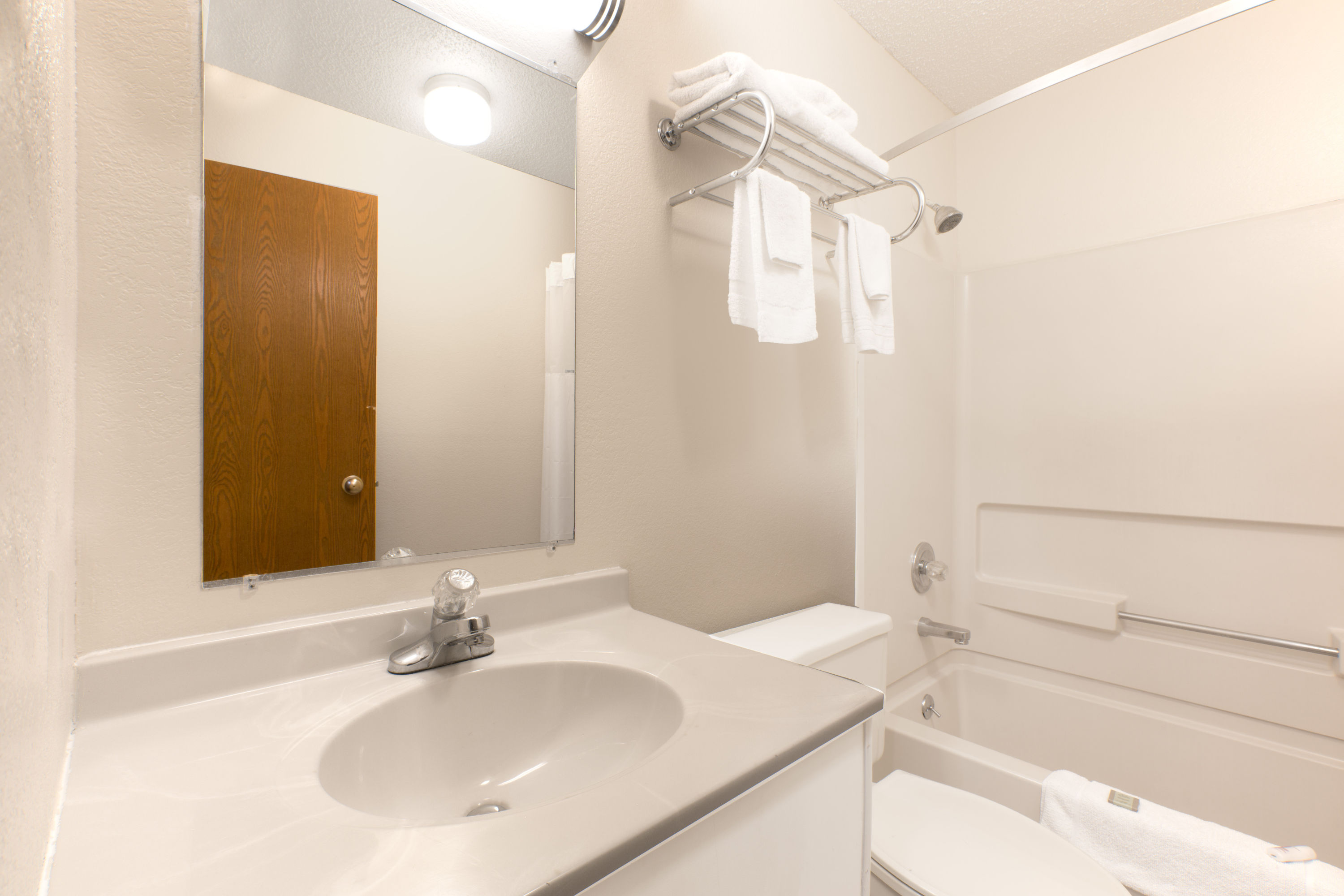 Guest room bath at the Super 8 by Wyndham Boonville in Boonville, Missouri