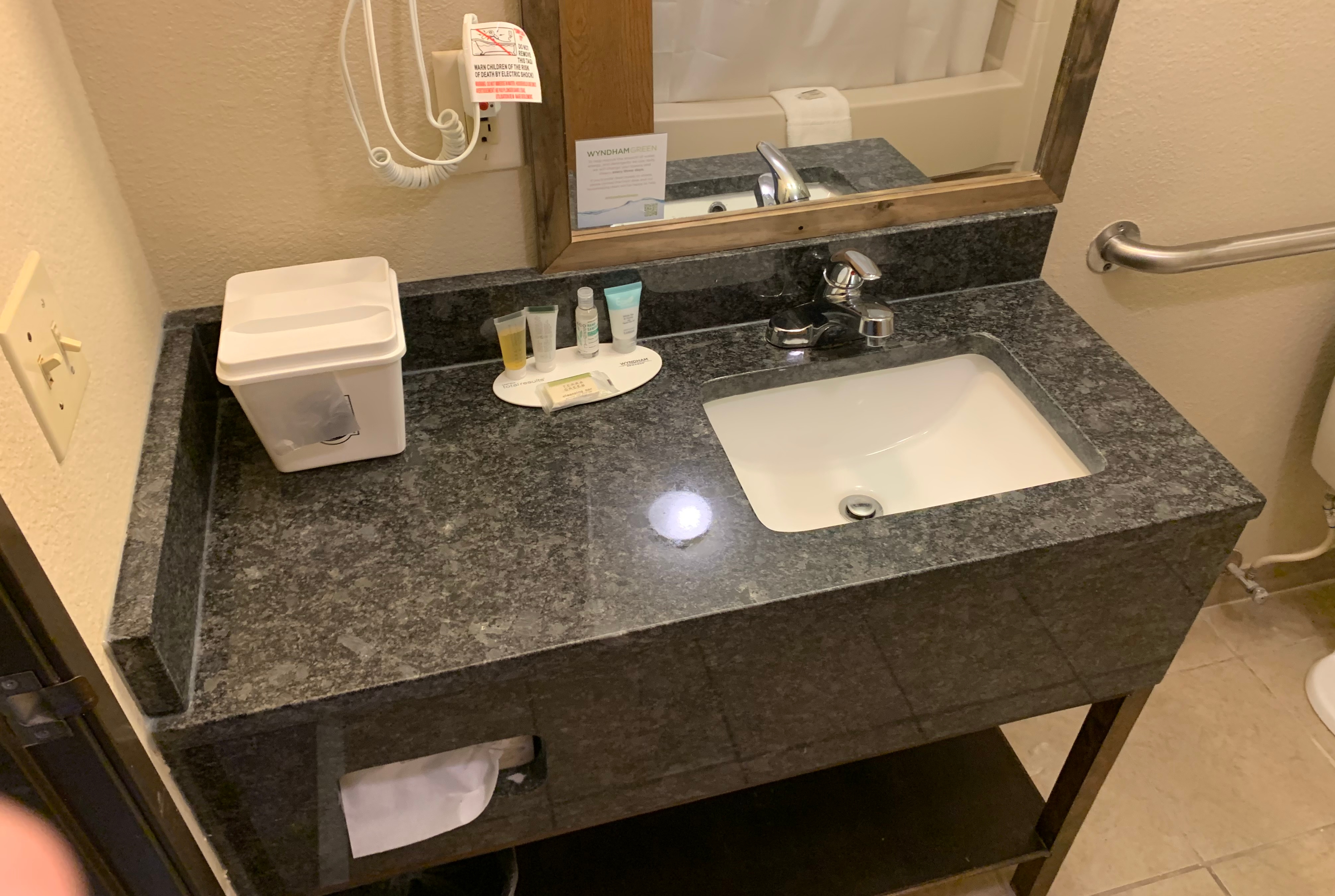 Guest room bath at the Super 8 by Wyndham Boonville in Boonville, Missouri