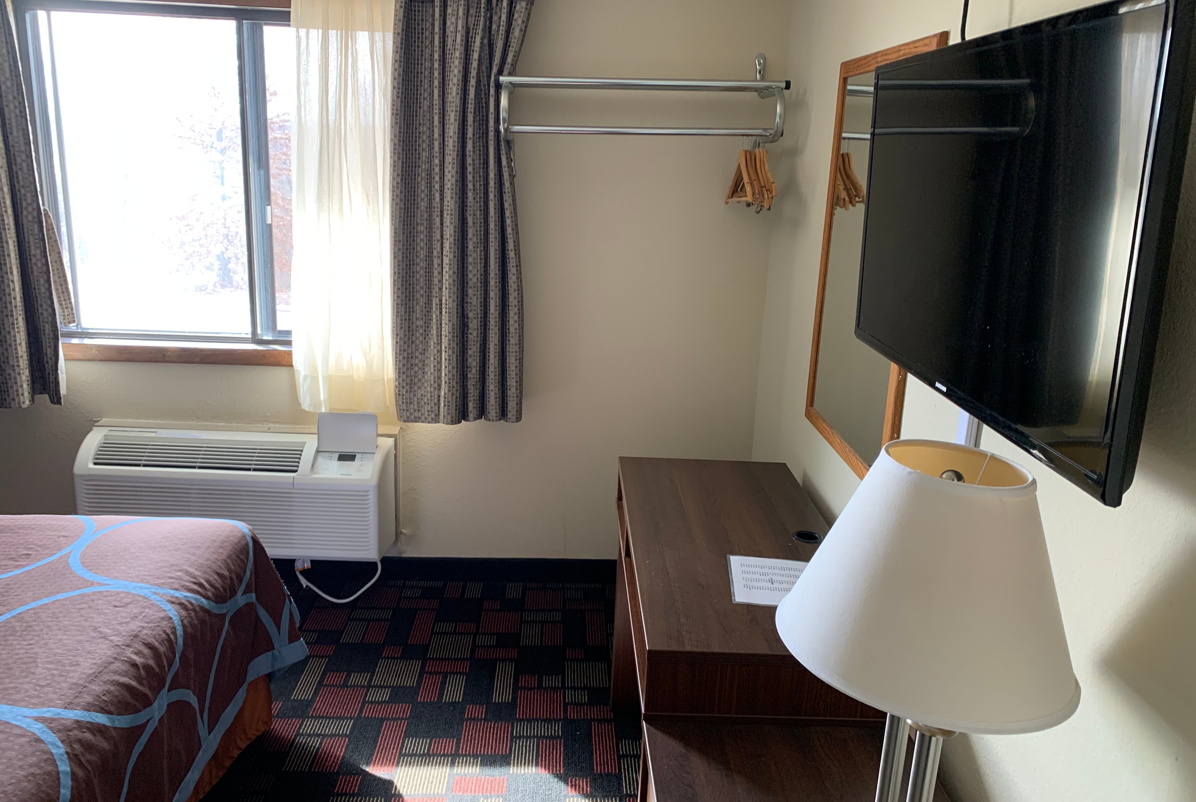 Guest room at the Super 8 by Wyndham Boonville in Boonville, Missouri
