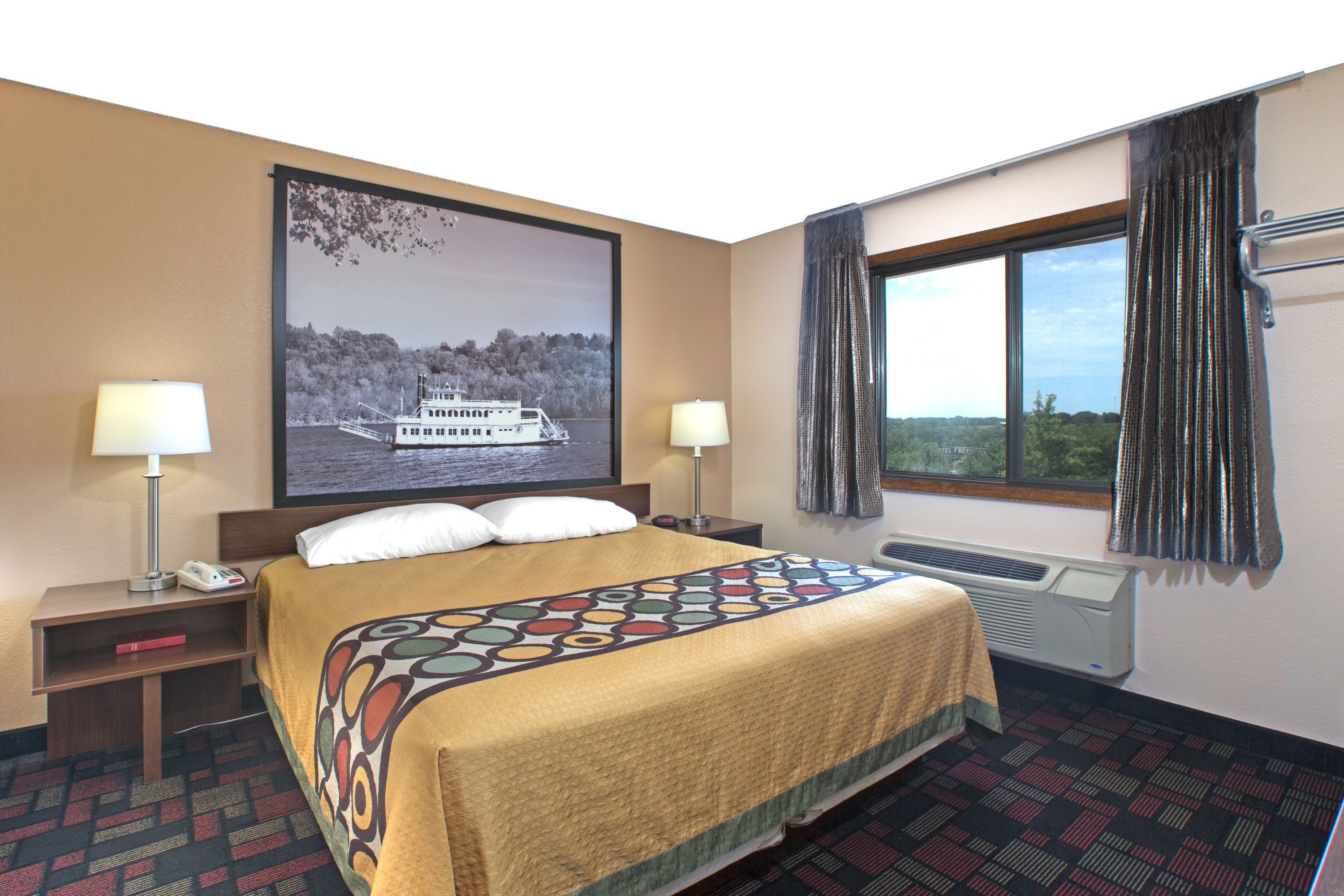 Super 8 by Wyndham Boonville suite in Boonville, Missouri