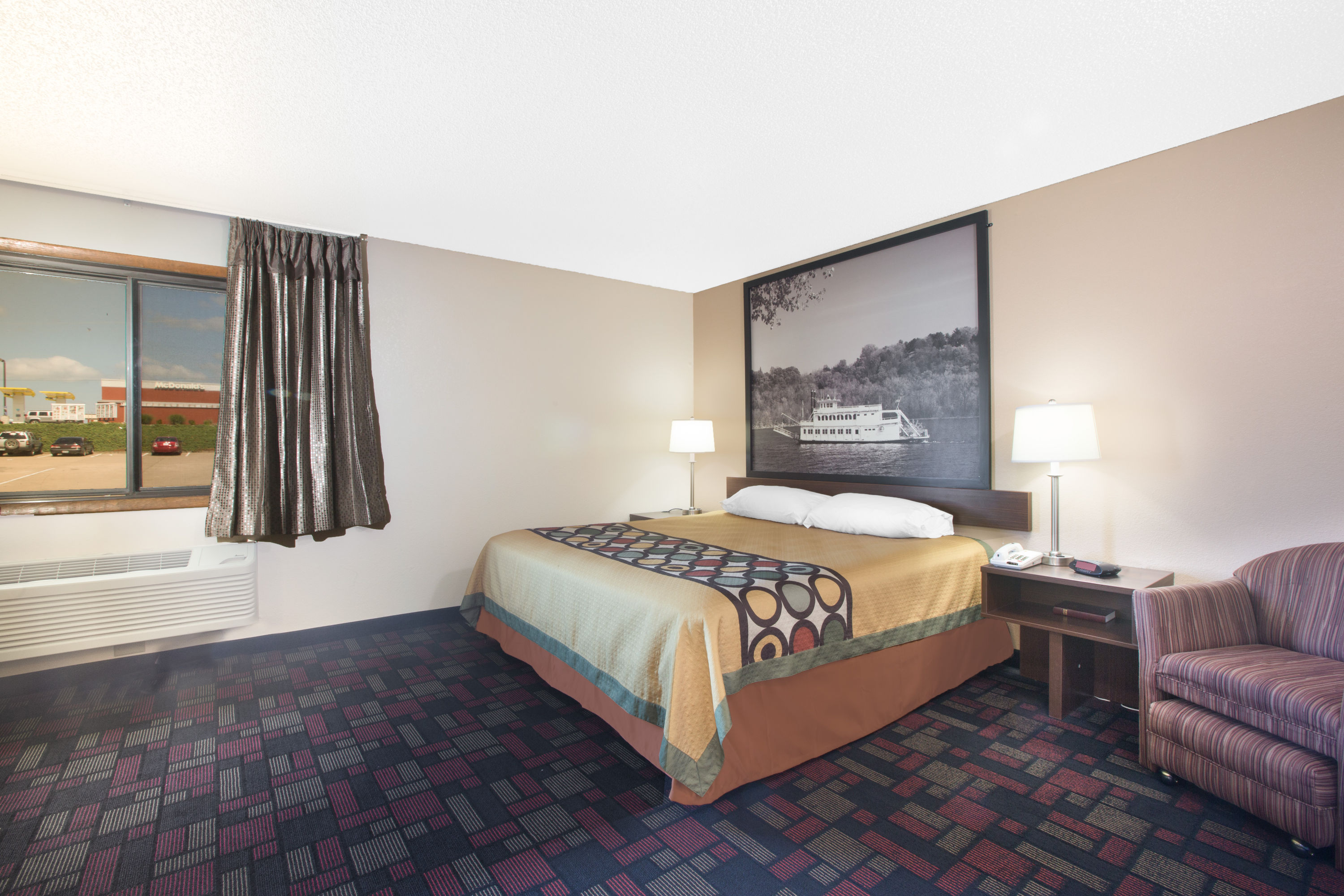 Super 8 by Wyndham Boonville suite in Boonville, Missouri