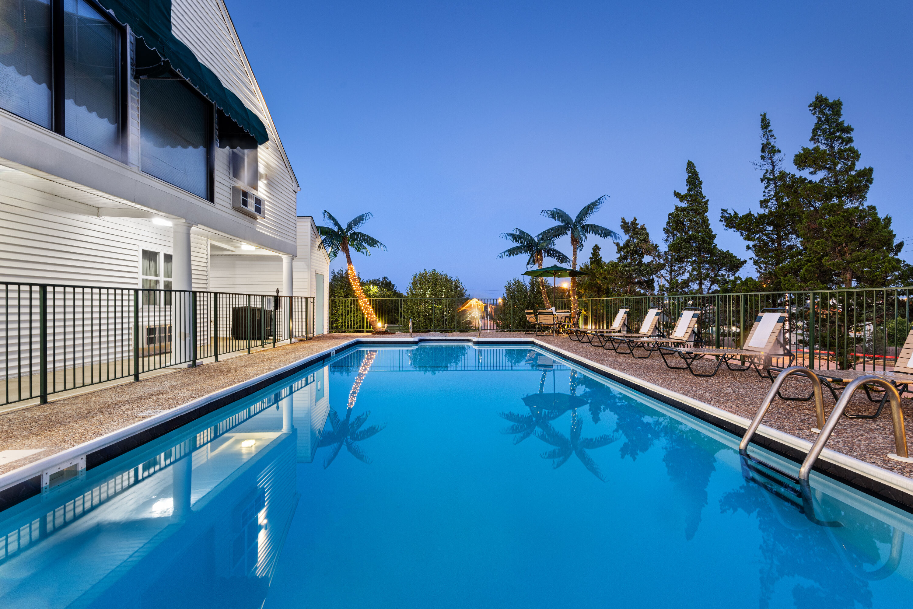 Pool night image at the Super 8 by Wyndham Branson / Shepherd of the Hills Exwy in Branson, Missouri