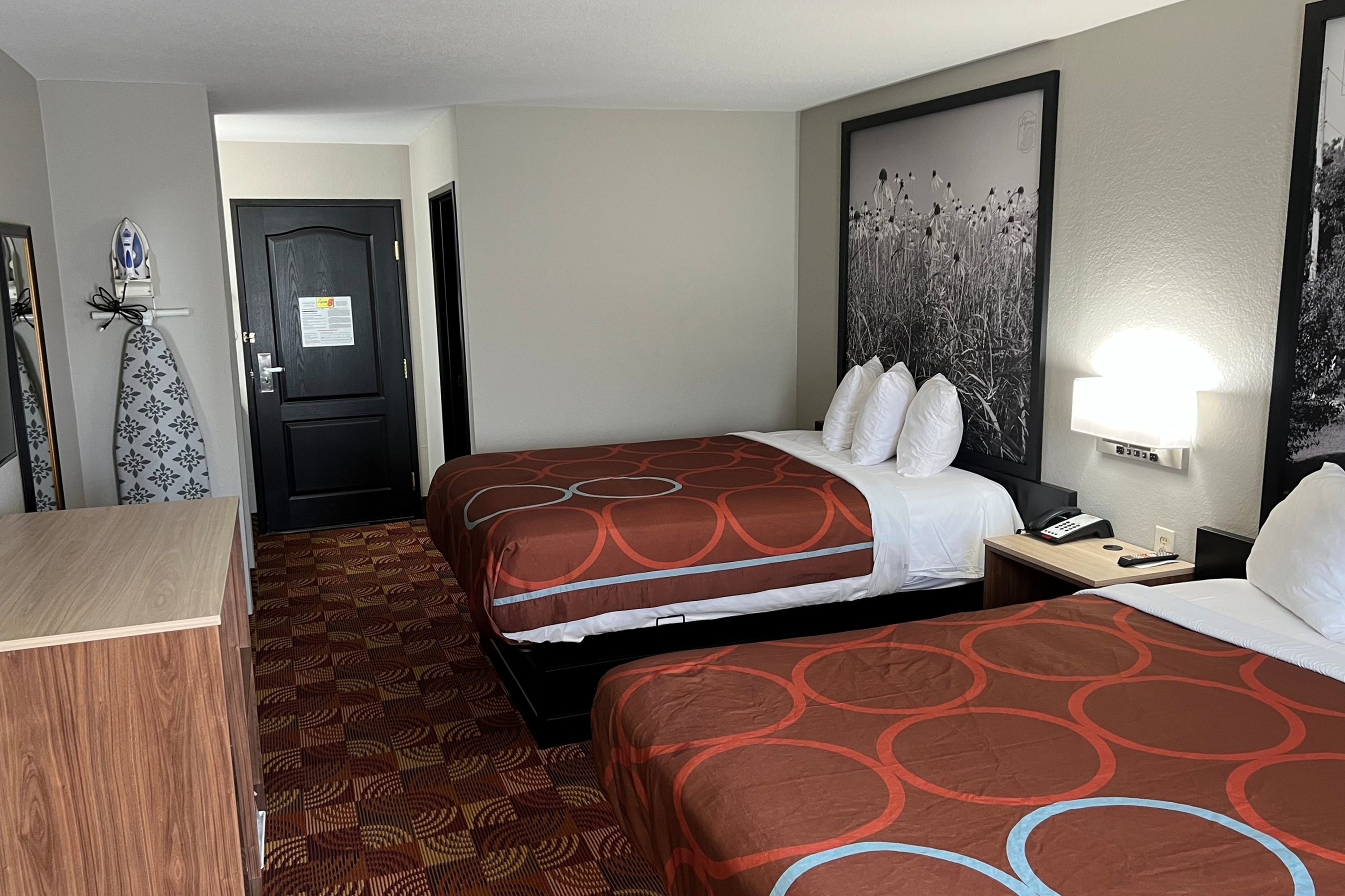 Guest room at the Super 8 by Wyndham Lake of the Ozarks in Eldon, Missouri