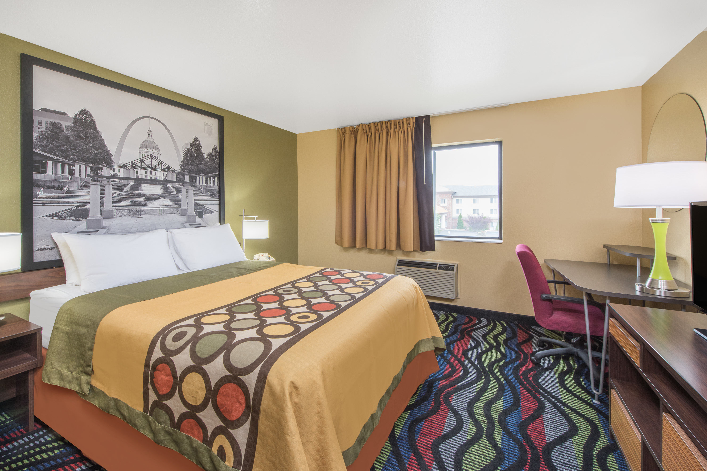 Guest room at the Super 8 by Wyndham Farmington in Farmington, Missouri