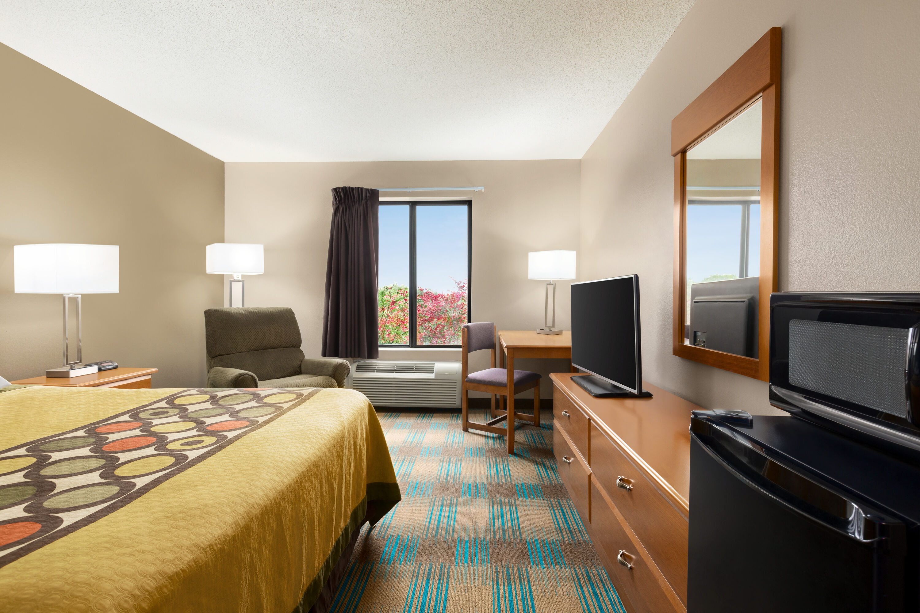 Guest room at the Super 8 by Wyndham Hannibal in Hannibal, Missouri