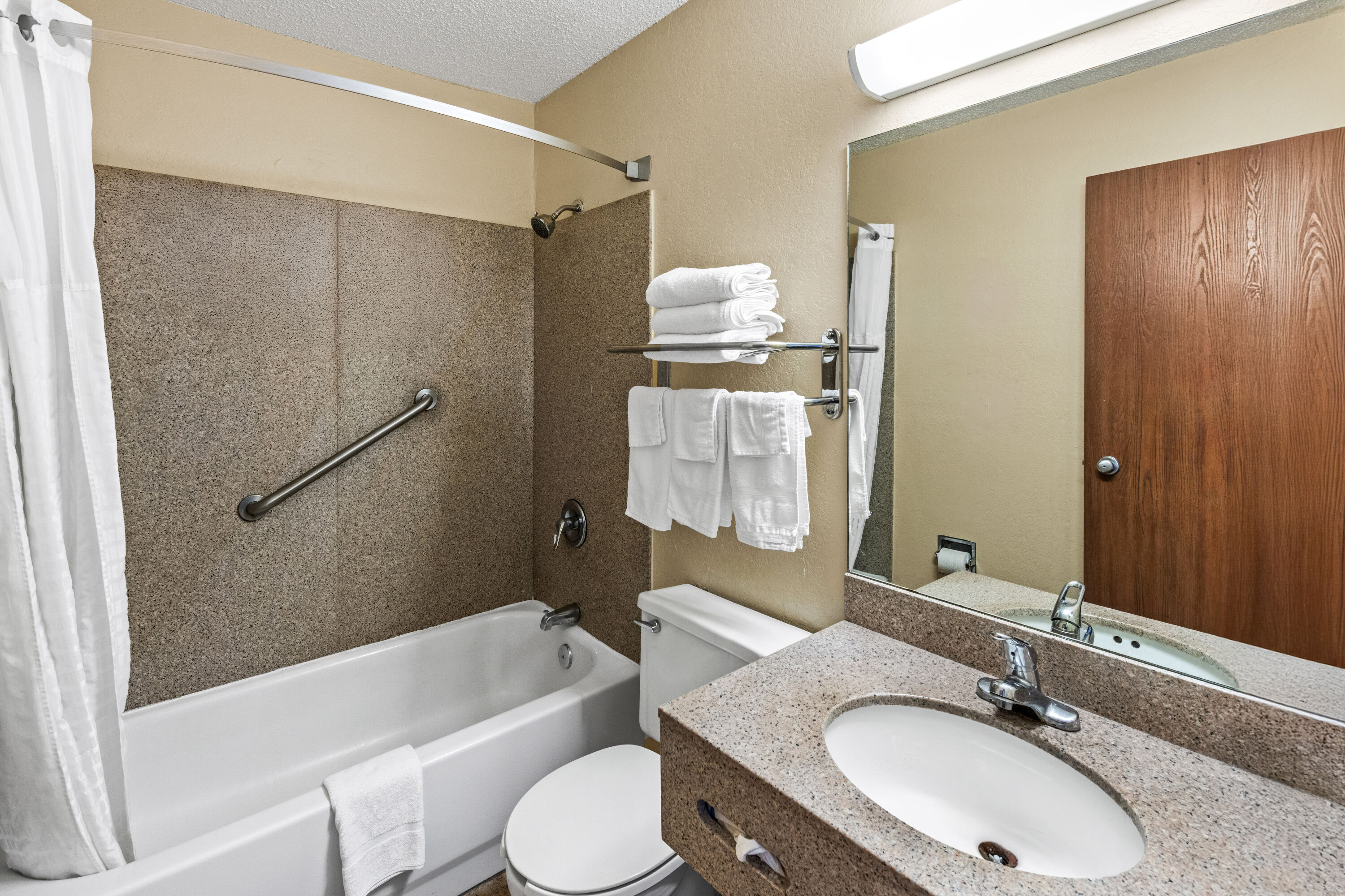 Guest room bath at the Super 8 by Wyndham Independence Kansas City in Independence, Missouri