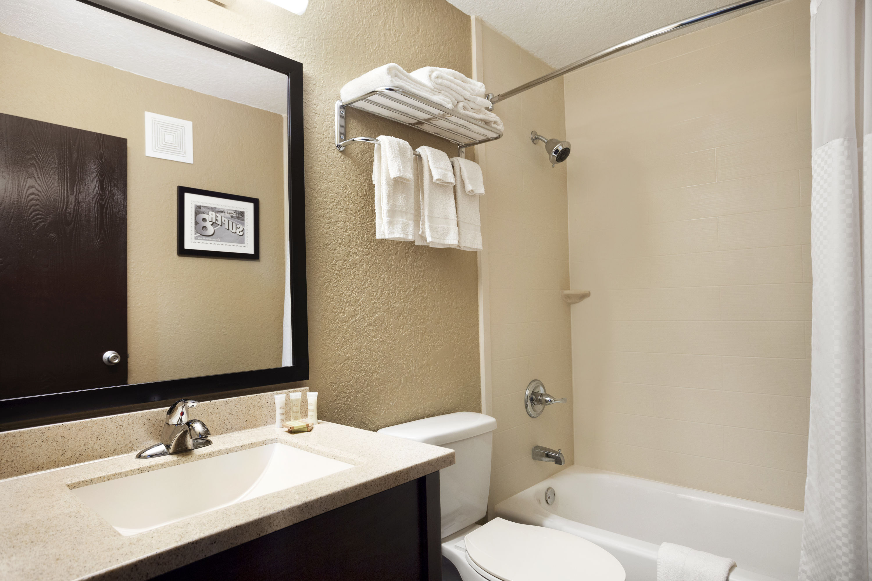 Guest room bath at the Super 8 by Wyndham Joplin in Joplin, Missouri