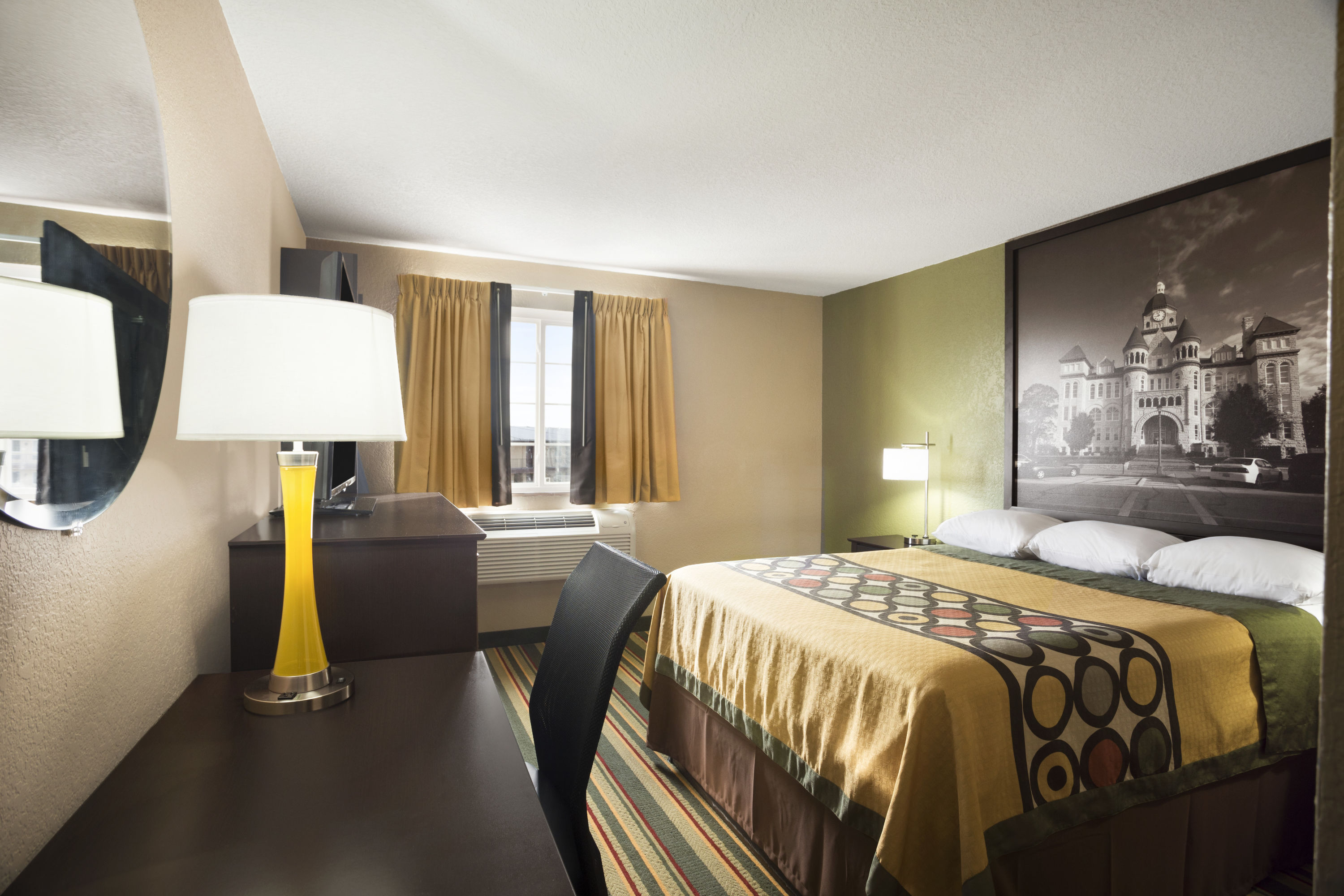Guest room at the Super 8 by Wyndham Joplin in Joplin, Missouri