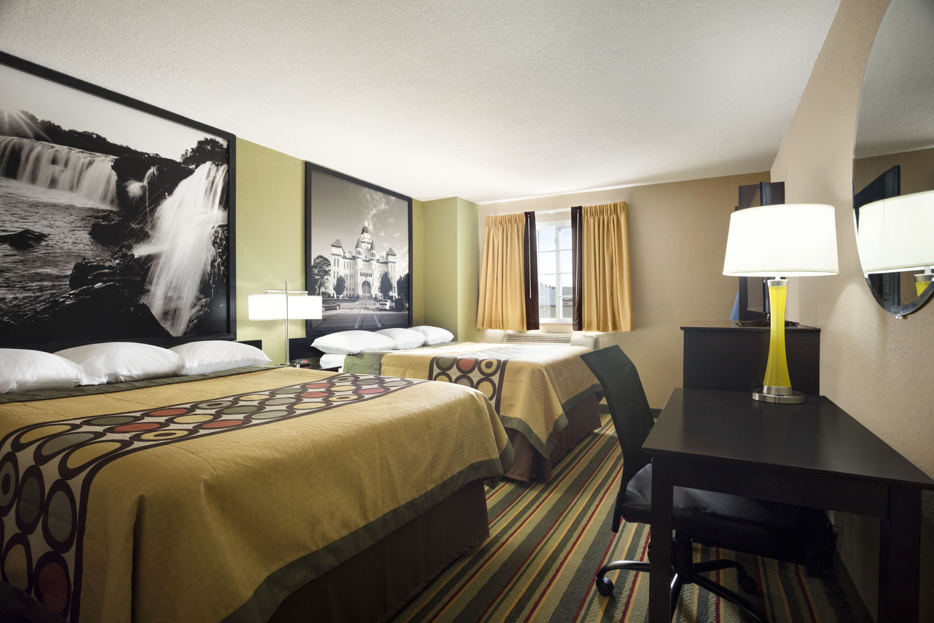 Guest room at the Super 8 by Wyndham Joplin in Joplin, Missouri