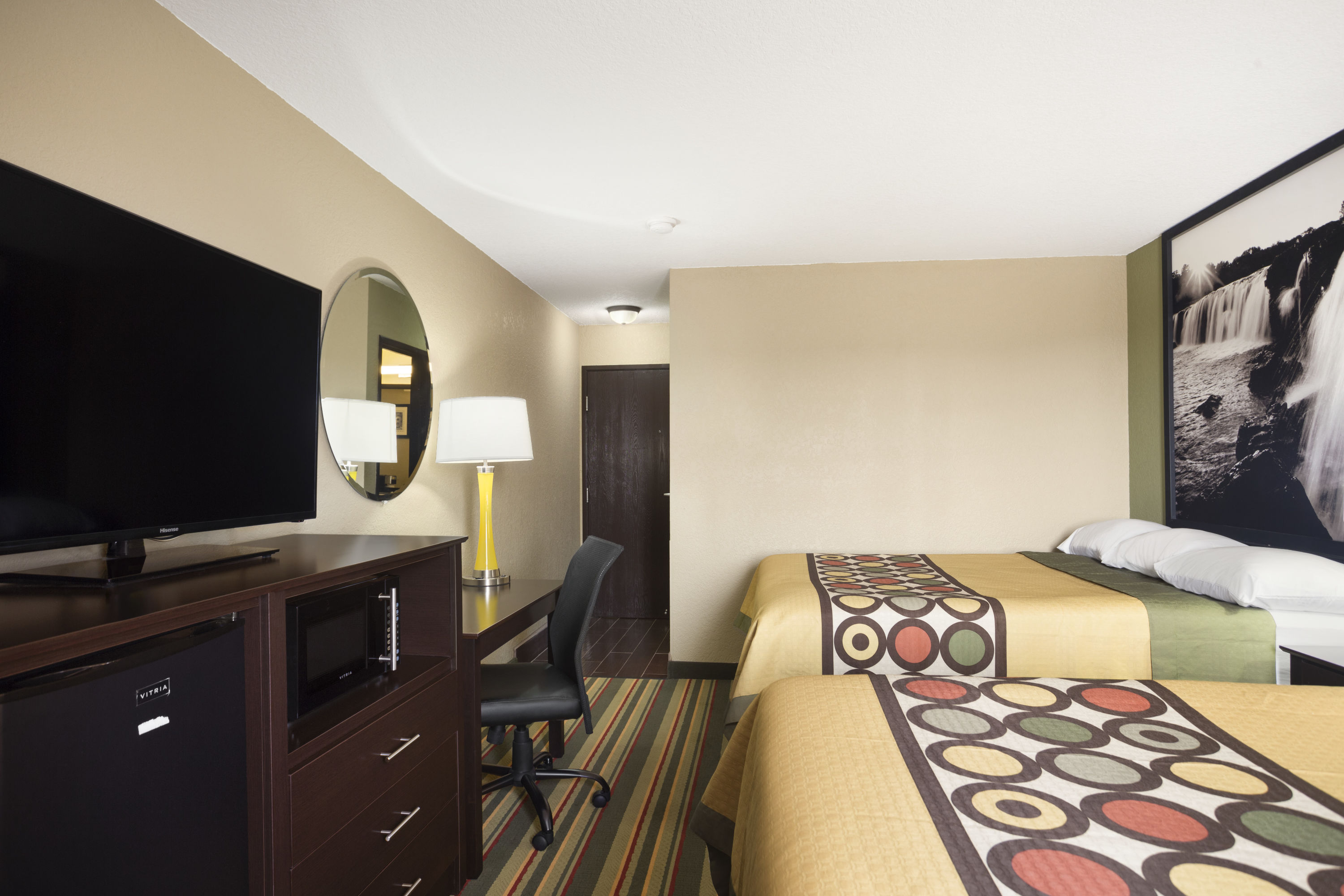 Guest room at the Super 8 by Wyndham Joplin in Joplin, Missouri