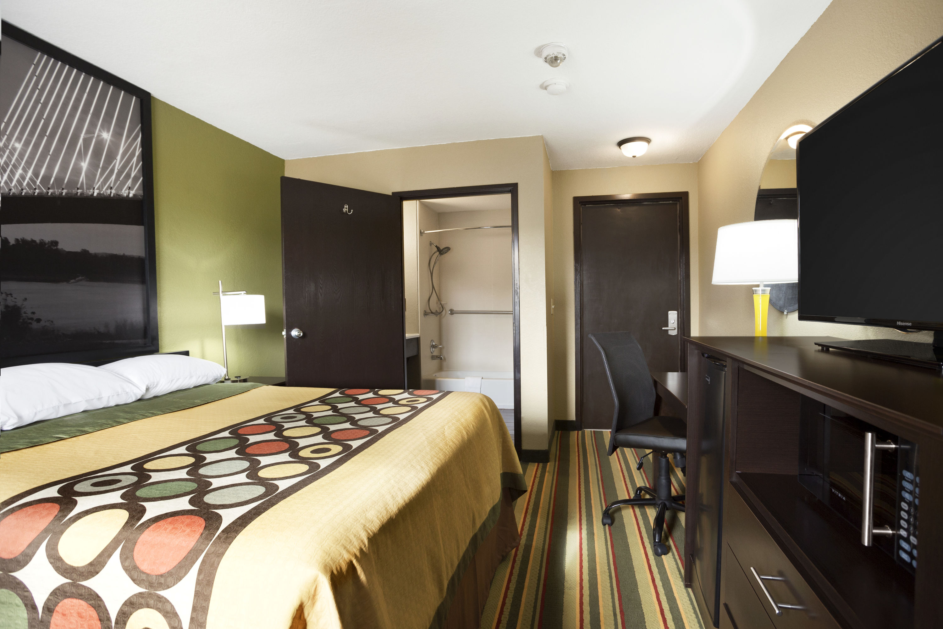 Guest room at the Super 8 by Wyndham Joplin in Joplin, Missouri