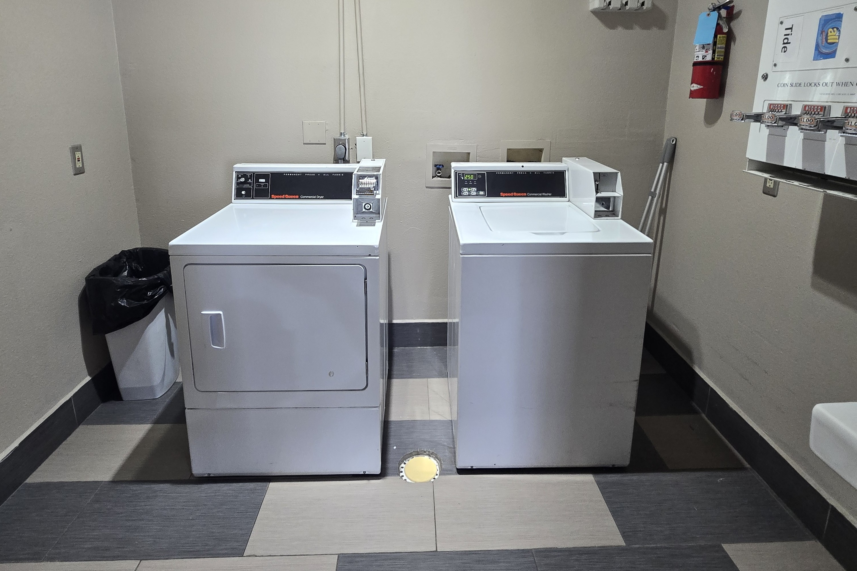 Laundry facilities at Super 8 by Wyndham Kansas City in Kansas City, Missouri