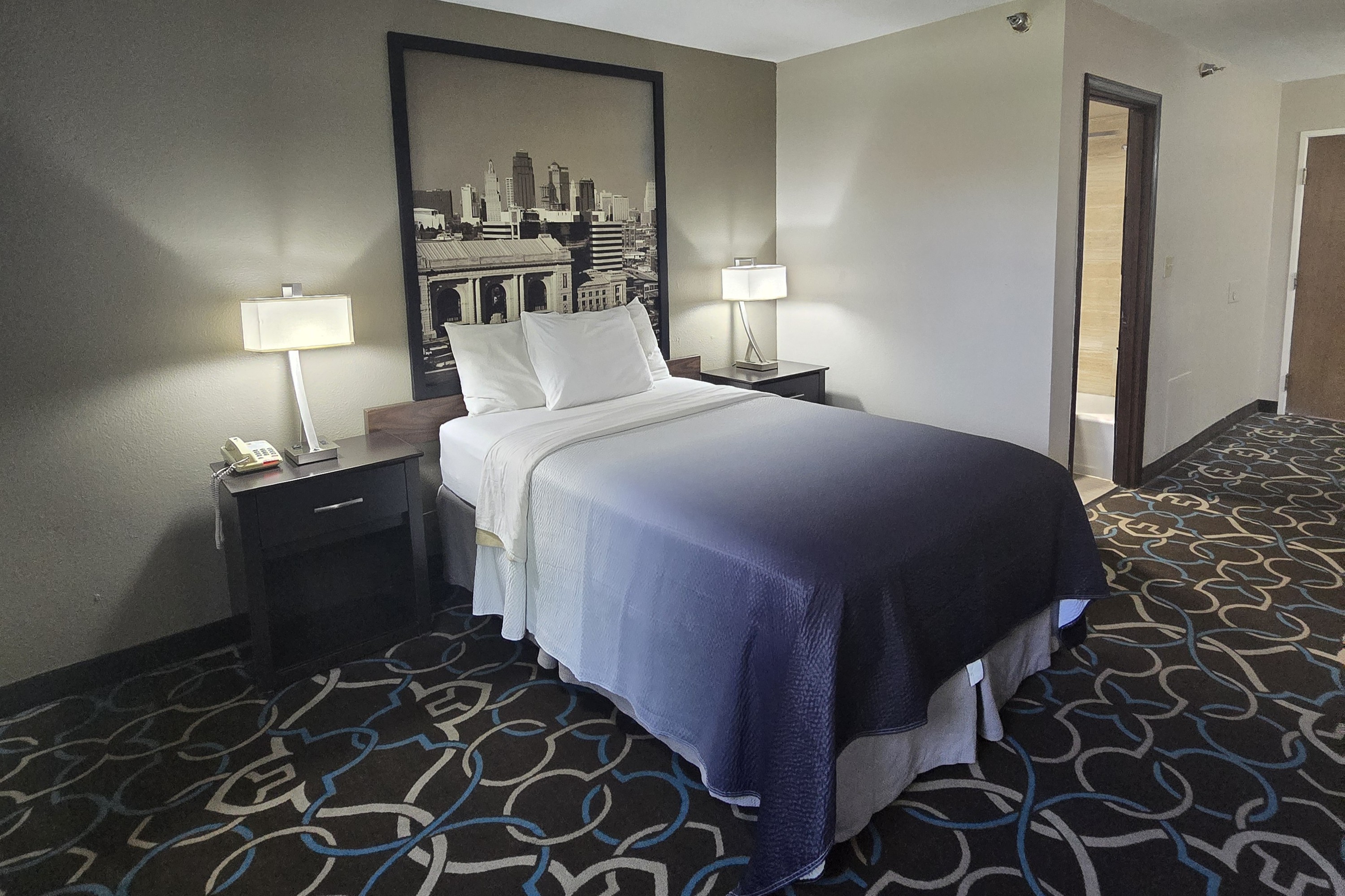 Guest room at the Super 8 by Wyndham Kansas City in Kansas City, Missouri