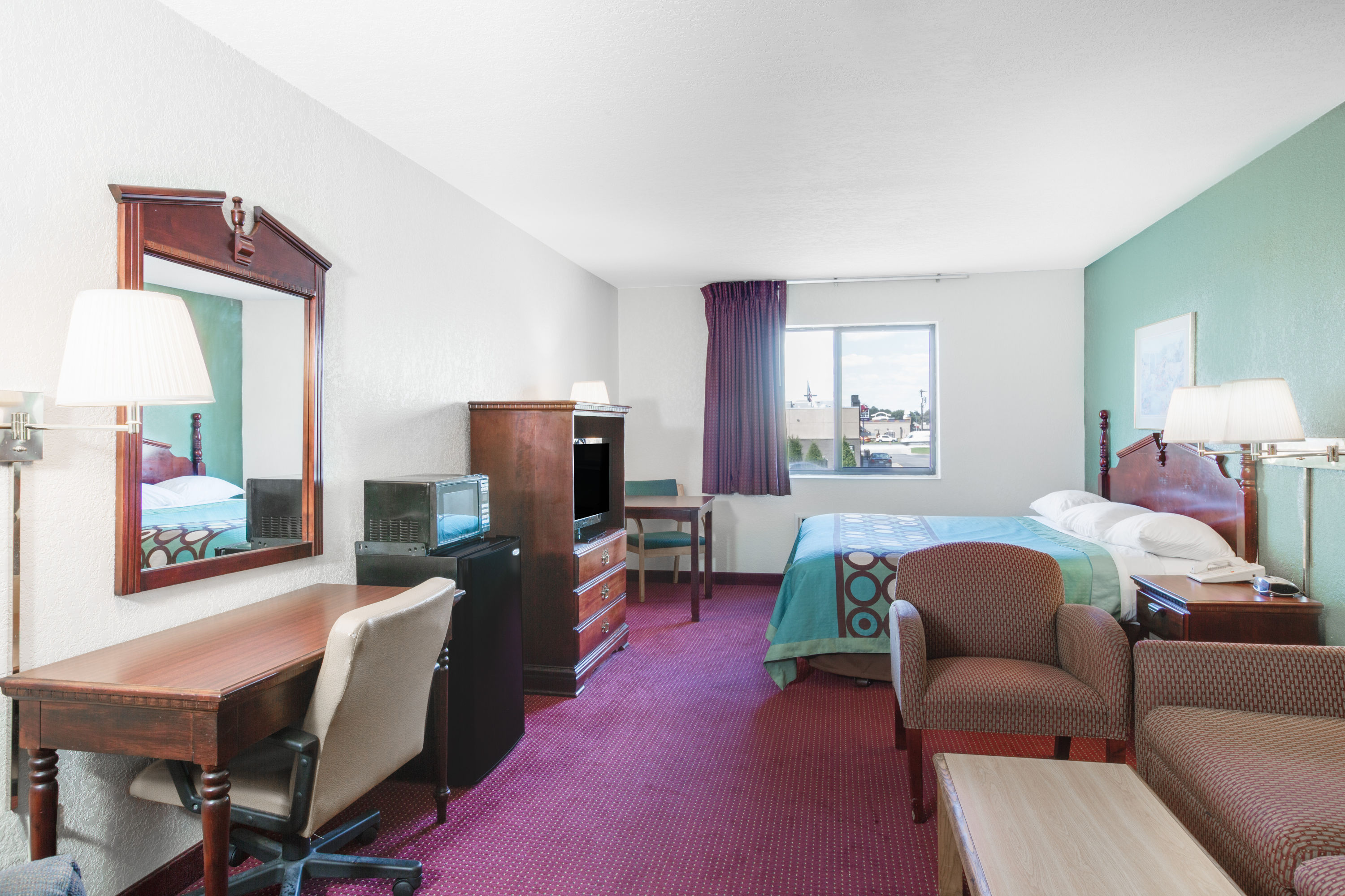 Guest room at the Super 8 by Wyndham Kennett in Kennett, Missouri