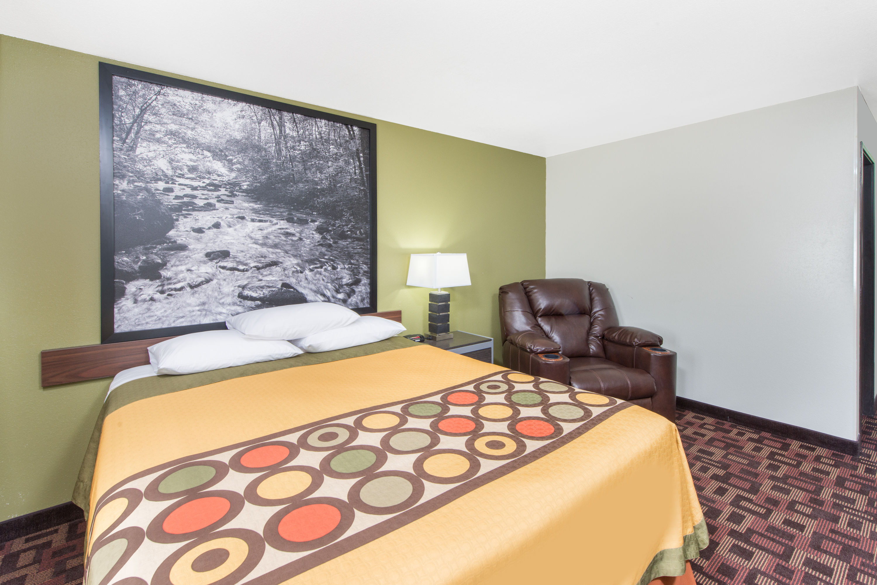 Guest room at the Super 8 by Wyndham Moberly MO in Moberly, Missouri