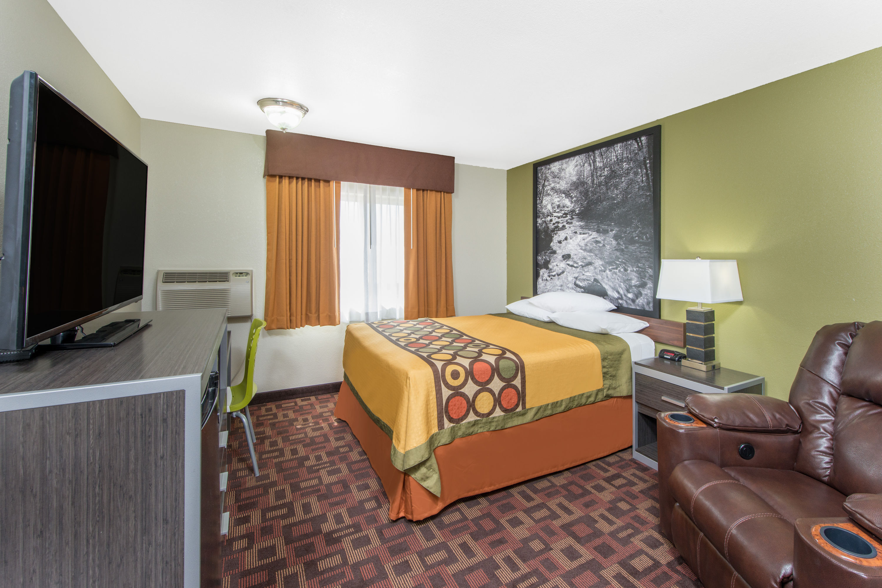 Guest room at the Super 8 by Wyndham Moberly MO in Moberly, Missouri