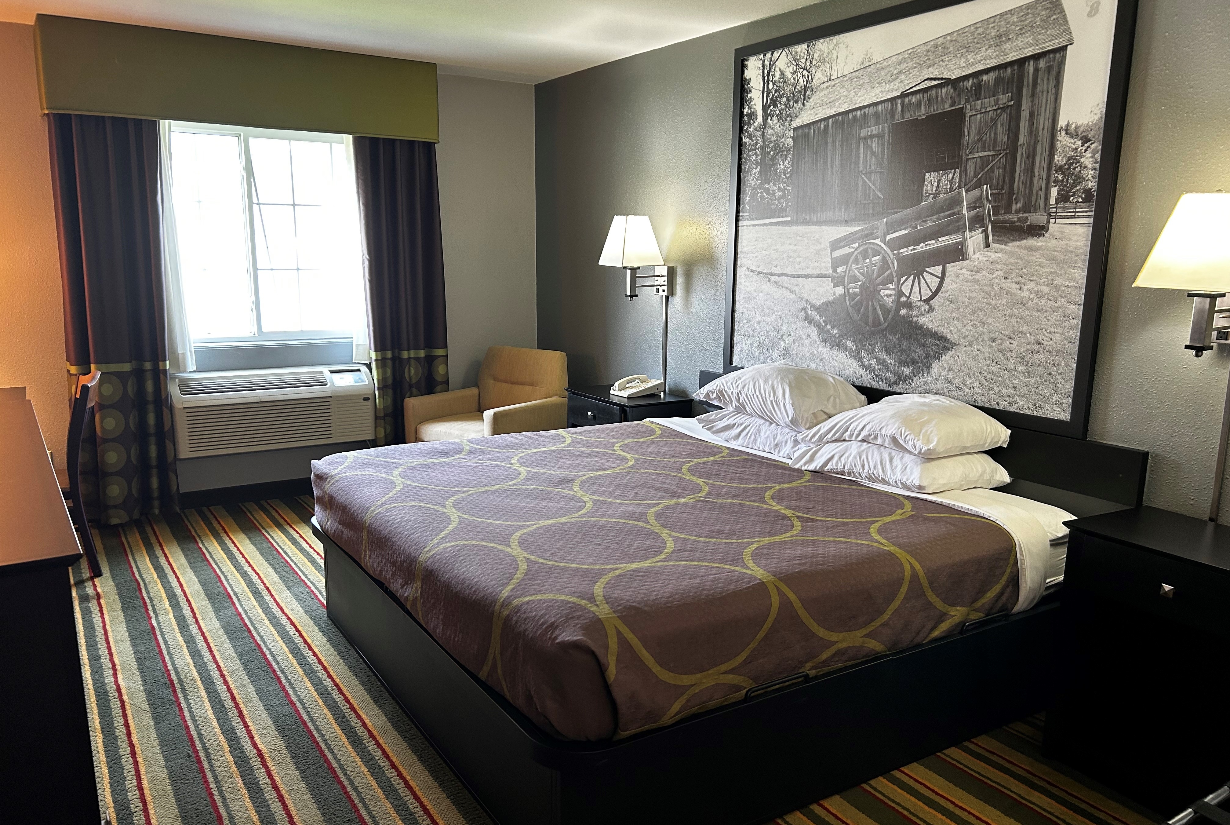 Guest room at the Super 8 by Wyndham Mound City in Mound City, Missouri