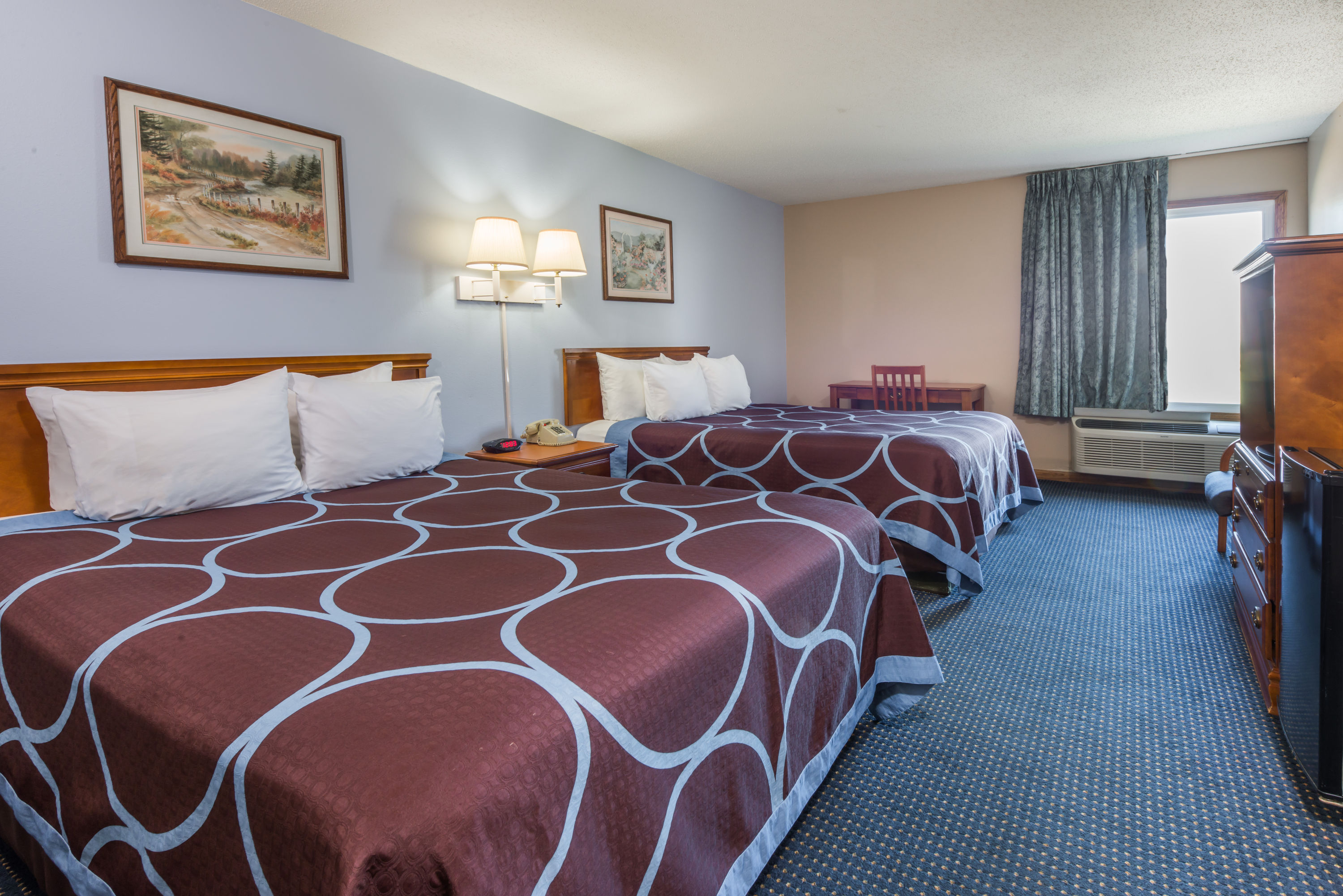 Guest room at the Super 8 by Wyndham O'Fallon MO/St. Louis Area in OFallon, Missouri