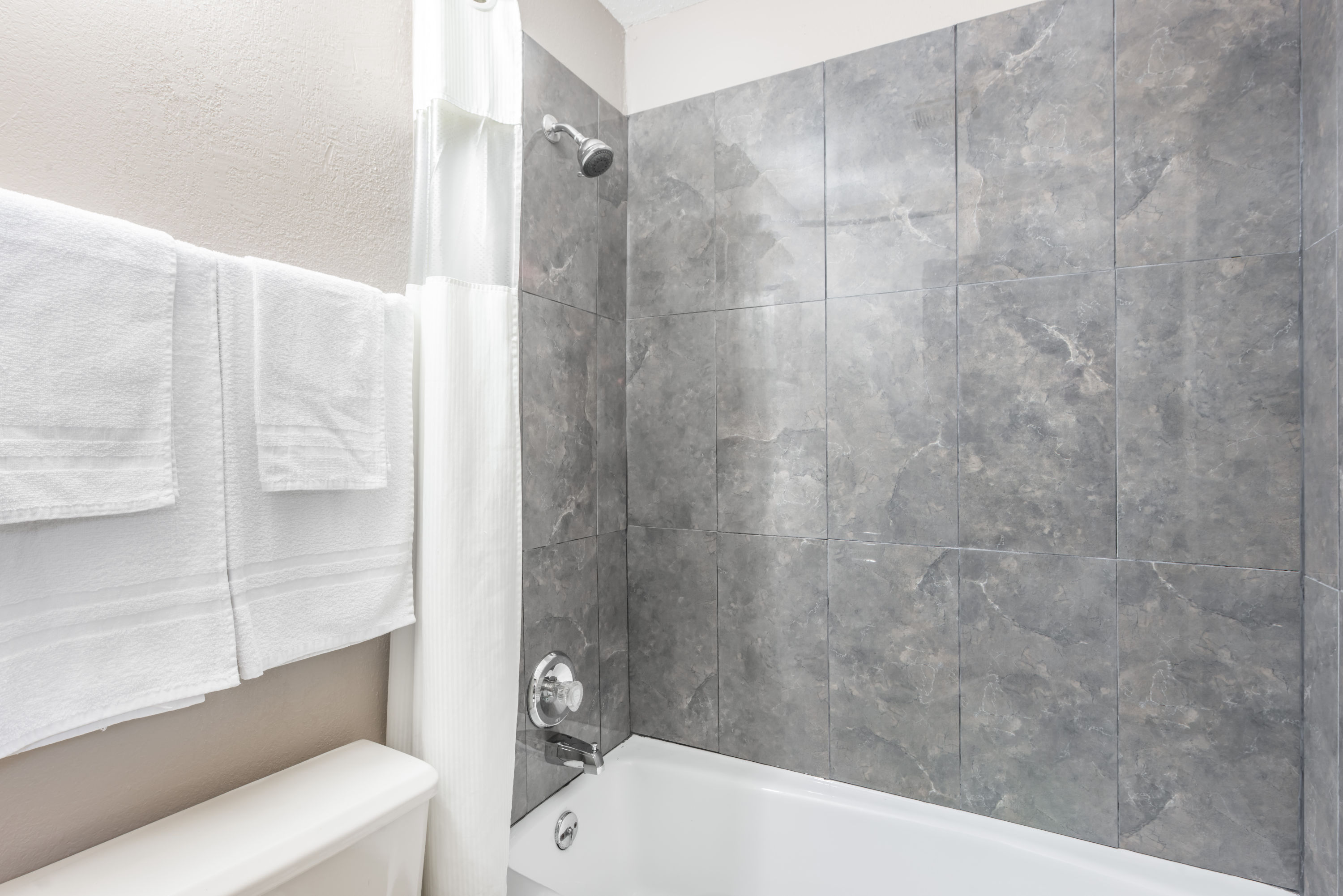 Guest room at the Super 8 by Wyndham O'Fallon MO/St. Louis Area in OFallon, Missouri