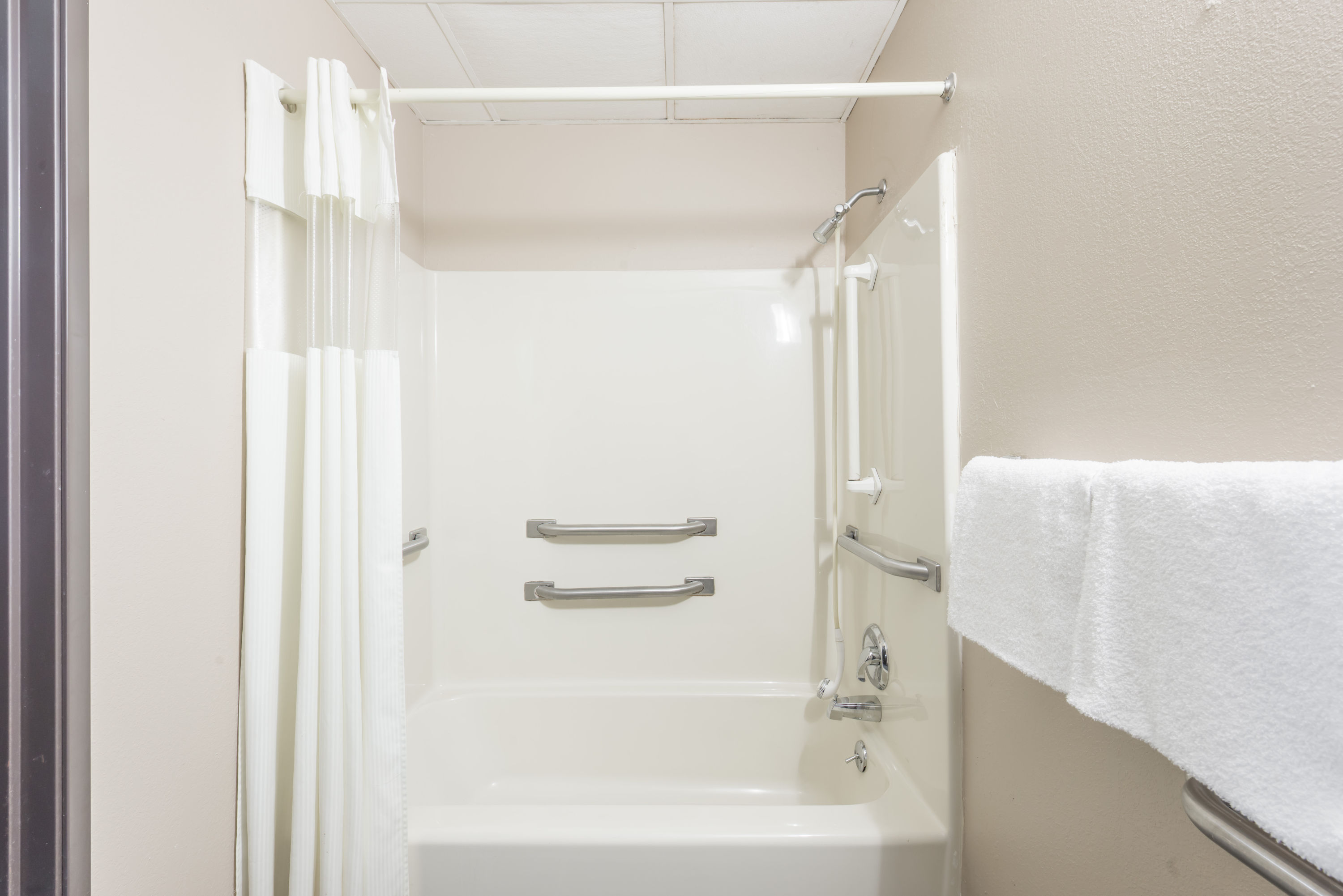 Guest room at the Super 8 by Wyndham O'Fallon MO/St. Louis Area in OFallon, Missouri