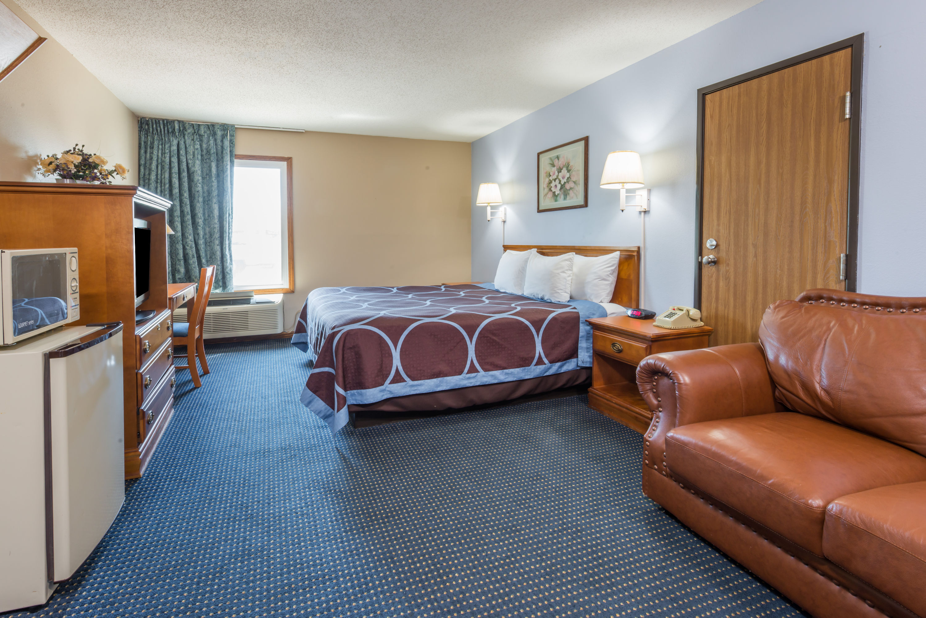 Guest room at the Super 8 by Wyndham O'Fallon MO/St. Louis Area in OFallon, Missouri